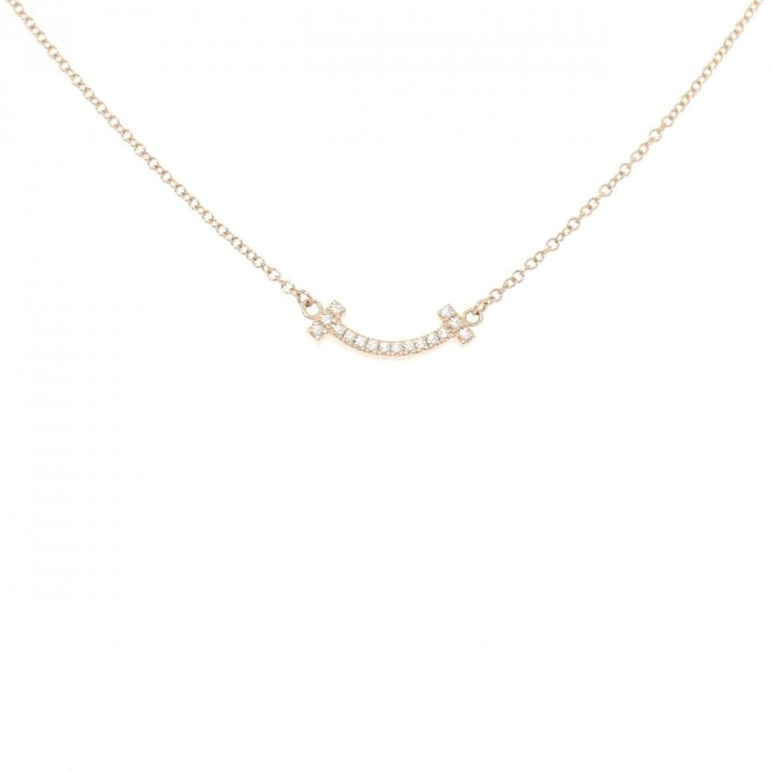 Tiffany T Smile Mini Necklace: --- Catalog ---Category: SizePendant Size: 3.6mm x 13.6mm / 0.14'' x 0.53''Neck Circumference: 41 cm - 46 cm / 16.14'' - 18.11''Category: DesignColor: Pink goldMaterial: Pink gold (18K)Pendant Type: