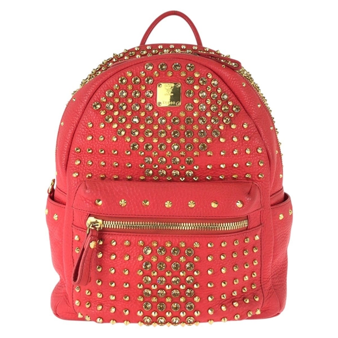 MCM Stark Studded Leather Backpack (MWK4SVE06RP001) - Red with Gold Hardware and Rhinestones Women's: --- Catalog ---Category: SizeSize (HxWxD): 31cm x 26cm x 13cm / 12.2'' x 10.23'' x 5.11''Category: DesignType: BackpackColor: Red colorGender: WomenMaterial: Leather , Rhinestone Hardware Color: GoldC