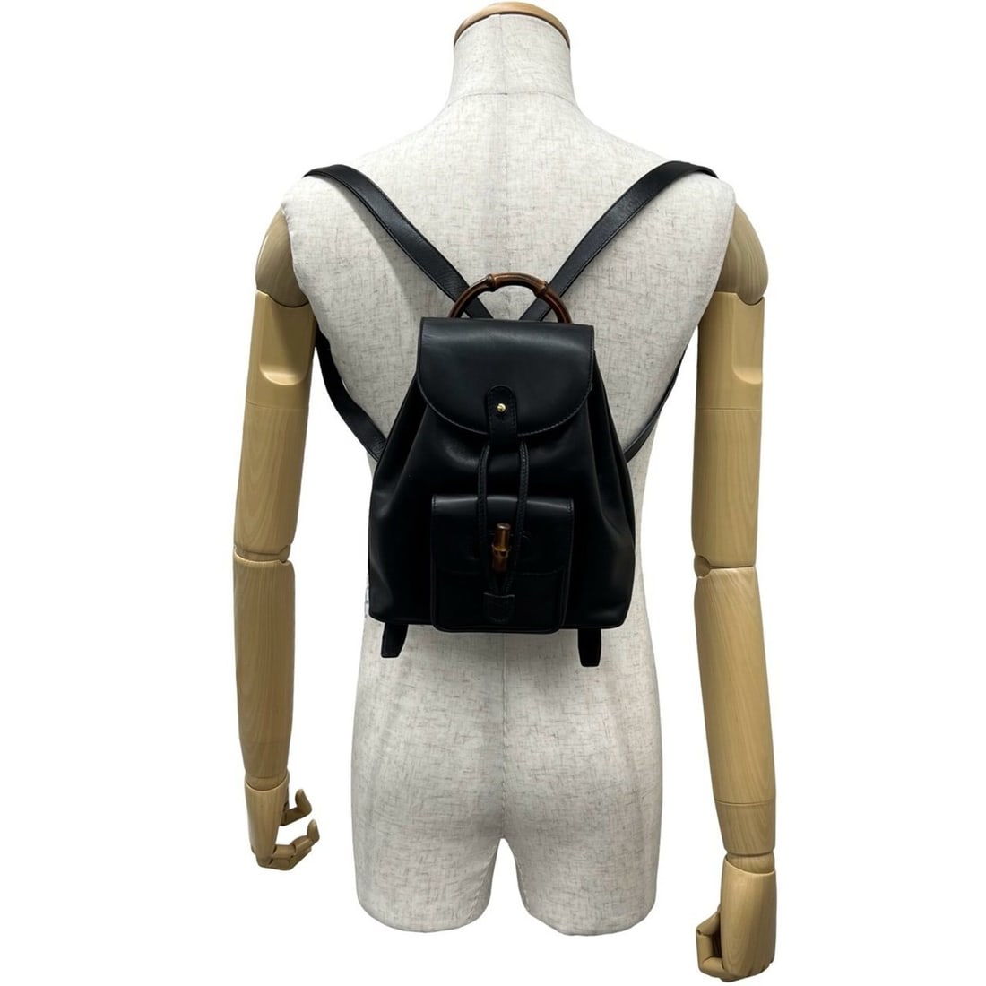 GUCCI Vintage Bamboo Leather Backpack (Black) - Item No. 37828: --- Catalog ---Category: SizeSize (HxWxD): 24.5cm x 21cm x 7cm / 9.64'' x 8.26'' x 2.75''Category: DesignType: BackpackColor: BlackGender: WomenMaterial: Leather , Bamboo Category: GeneralBrand: Gucci