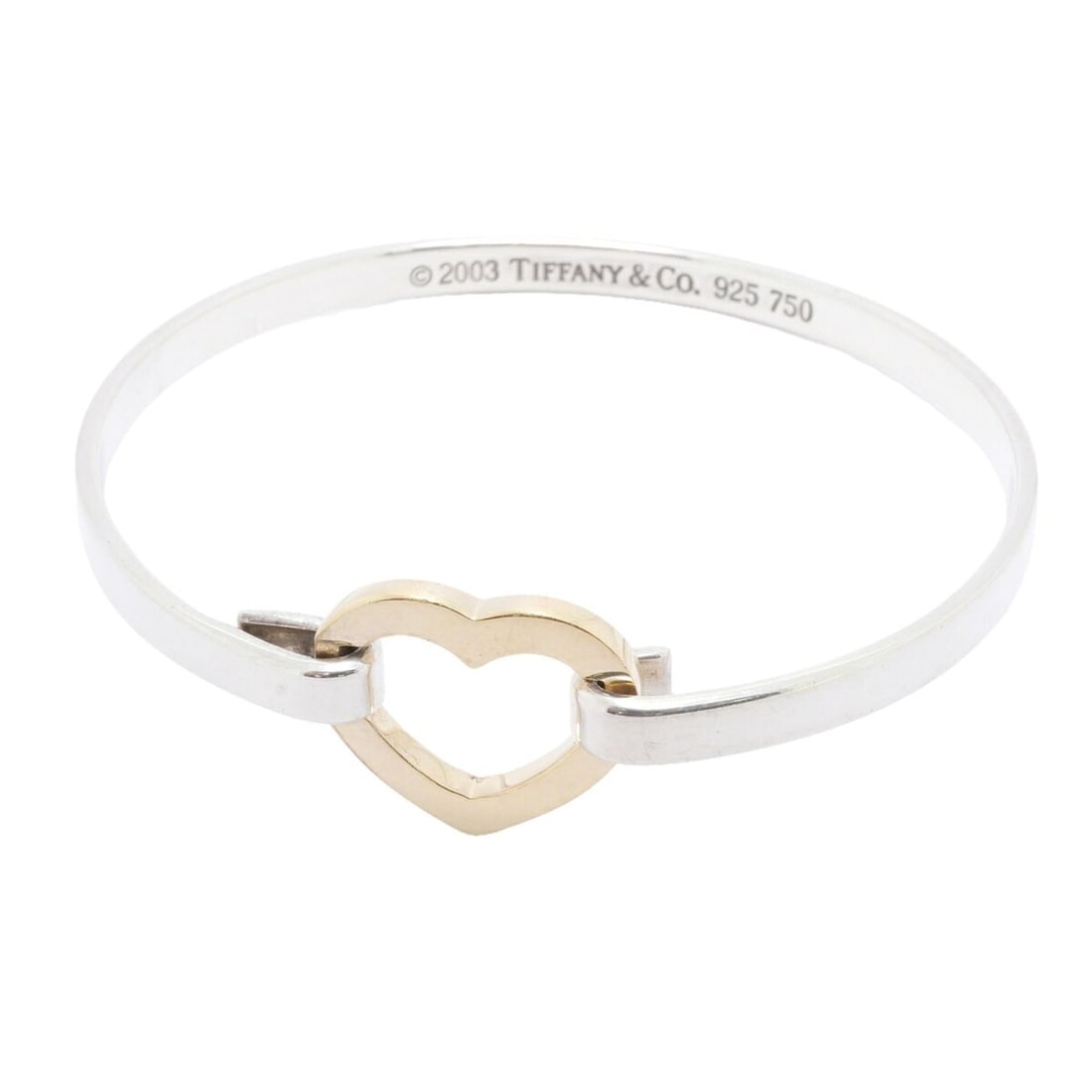 Tiffany & Co. Heart Bangle, 18K Yellow Gold (KYG), Sterling Silver (925), Women's: --- Catalog ---Category: SizeLength: 16cm / 6.29''Category: DesignType: BangleGender: WomenMaterial: Silver 925, Yellow gold (18K)Category: GeneralBrand: Tiffany--- Item List ---Section: ConditionRank
