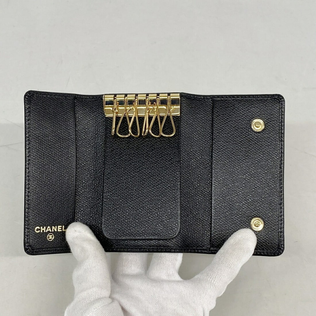 Chanel Accessories Key Case Coco Button Leather Black Women's: --- Catalog ---Category: DesignType: KeycaseColor: BlackGender: WomenMaterial: Leather Category: GeneralBrand: ChanelCategory: Physical PropertiesSize (HxWxD): 6.5cm x 10.5cm x 1.5cm / 2.55'' x 4.13''