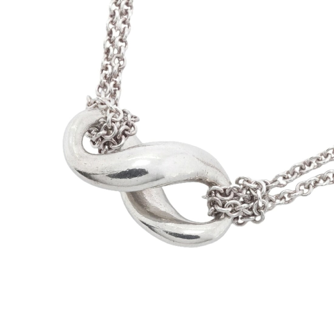 Tiffany & Co. Infinity Double Chain Necklace, Sterling Silver 925, Women's: --- Catalog ---Category: SizePendant Size: 9mm x 18mm / 0.35'' x 0.7''Neck Circumference: 40 cm / 15.74''Category: DesignGender: WomenMaterial: Silver 925Necklace Type: NecklaceCategory: GeneralBrand: