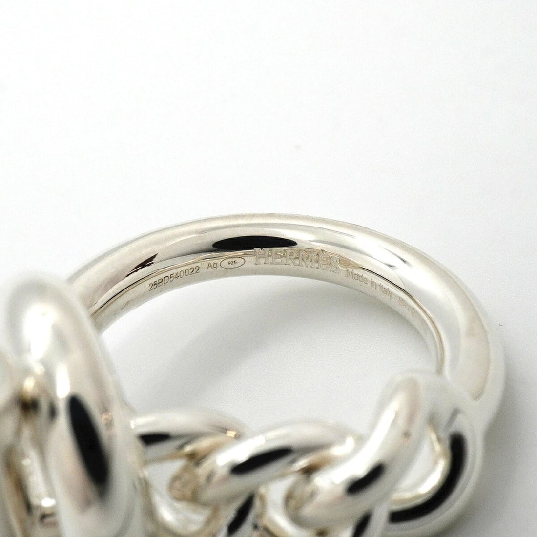 Hermes Croisette Ring, Sterling Silver 925, Size 57, Men's, P3689443: --- Catalog ---Category: SizeUS Size: 8.5Brand Size: 57Category: DesignType: Band ringGender: MenMaterial: Silver 925Category: GeneralBrand: Hermes--- Item List ---Section: ConditionRanking: Rank A Us