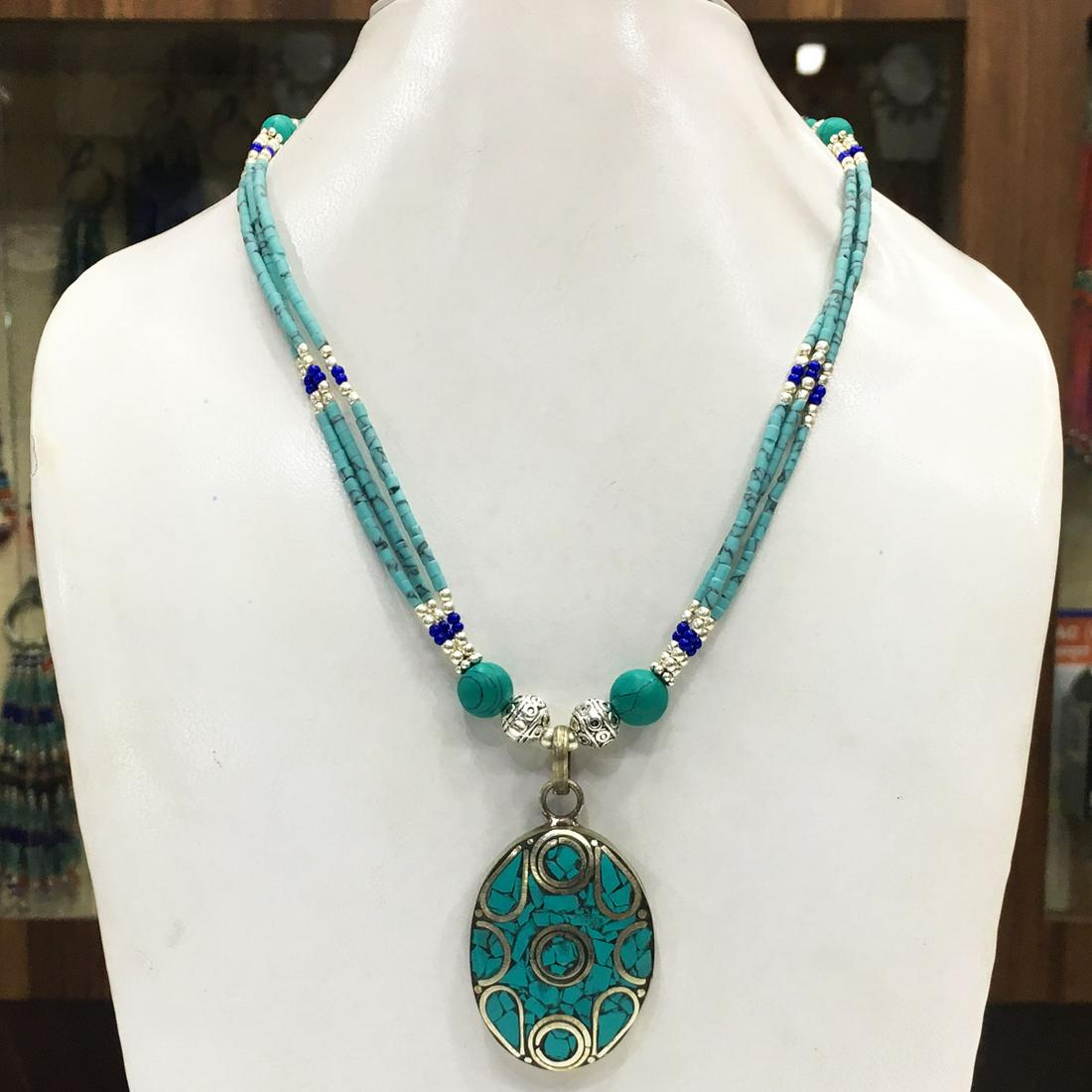 Tibetan Buddhist Turquoise Ethnic Pendant Necklace: Tibet Natural Stone Handmade Necklace......This elegant Necklace was handcrafted in Tibet, the home of exquisite jewelry craftsmanship. It was skillfully made with large natural Turquoise, each in a d