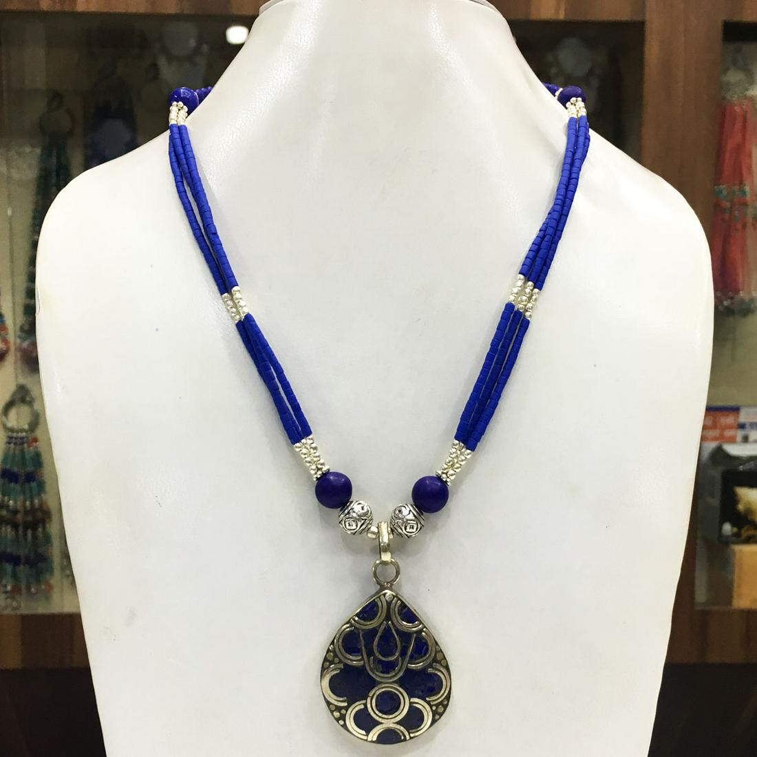 Tibetan Buddhist Lapis Ethnic Pendant Necklace: Tibet Natural Stone Handmade Necklace......This elegant Necklace was handcrafted in Tibet, the home of exquisite jewelry craftsmanship. It was skillfully made with large natural Turquoise, each in a d