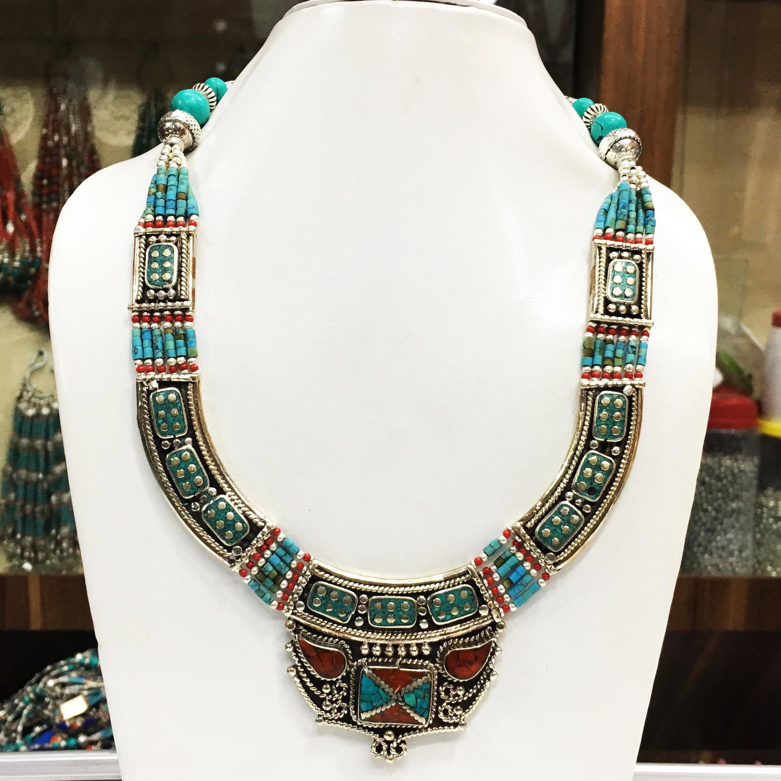 Tibetan Buddhist Turquoise & Coral Ethnic Necklace: Tibet Natural Stone Hand Made Coral Necklace......This elegant Necklace was handcrafted in Tibet, the home of exquisite jewelry craftsmanship. It was skillfully made with large natural Turquoise, each