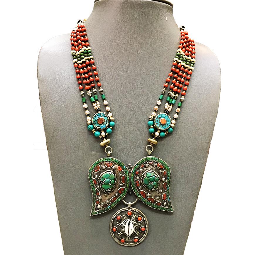 Tibetan Turquoise & Coral Handmade Chokar Old Necklace: Natural Old Turquoise & Coral NecklaceWeight: 120 Gram ApproxGemstones: Natural Turquoise & CoralBrand: HandmadeNecklace Length: 22” ApproxCountry/Region of Manufacture: Nepal