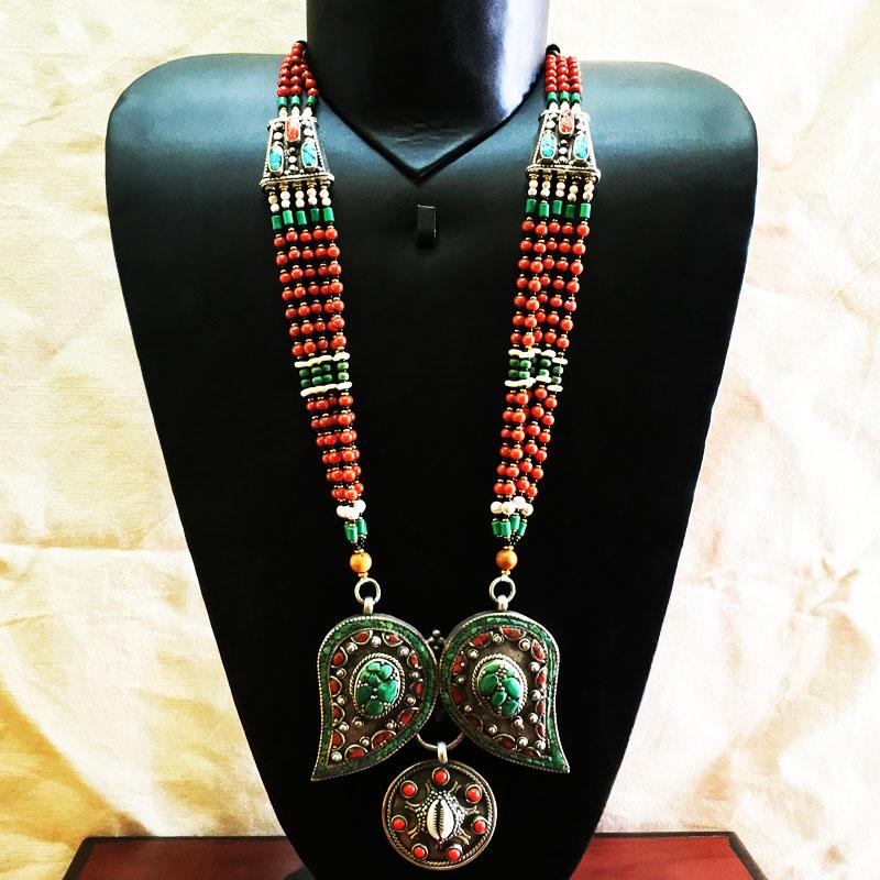 Tibetan Turquoise & Coral Handmade Chokar Old Necklace: Natural Old Turquoise & Coral NecklaceWeight: 120 Gram ApproxGemstones: Natural Turquoise & CoralBrand: HandmadeNecklace Length: 22” ApproxCountry/Region of Manufacture: Nepal