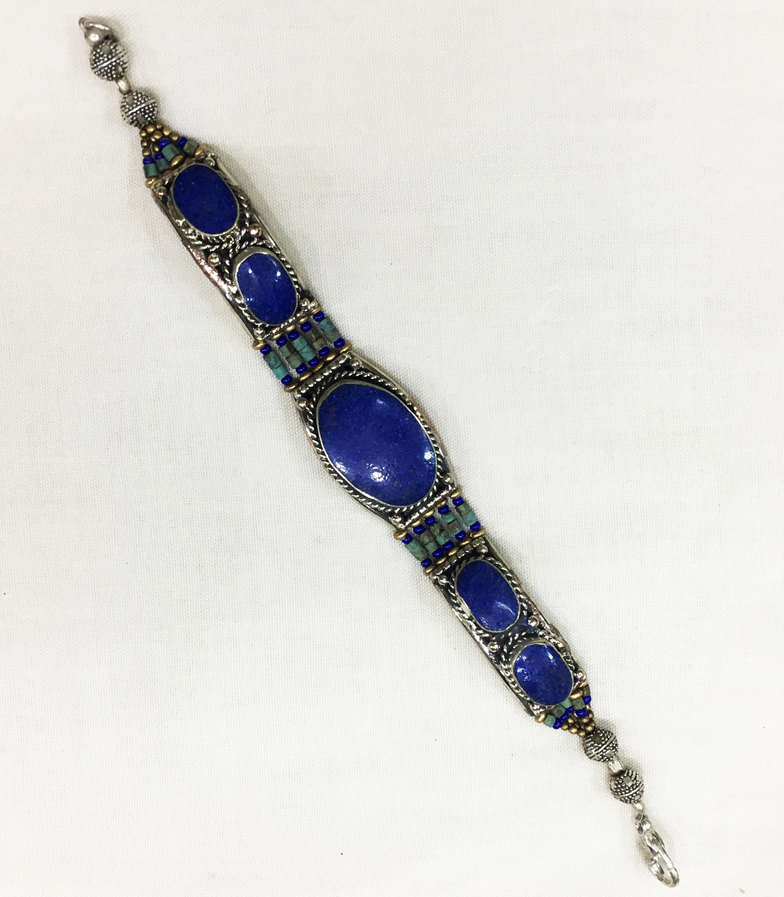 Ethnic Antique Lapis Choker Handmade Bracelet: TIBETAN TURQUOISE & CORAL HANDMADE BRACELETWeight: 30 Gram ApproxGemstones: Turquoise & Coral, LapisBrand: HandmadeBracelet Length: 6 to 7 InchCountry/Region of Manufacture: Kathmandu/Nepal