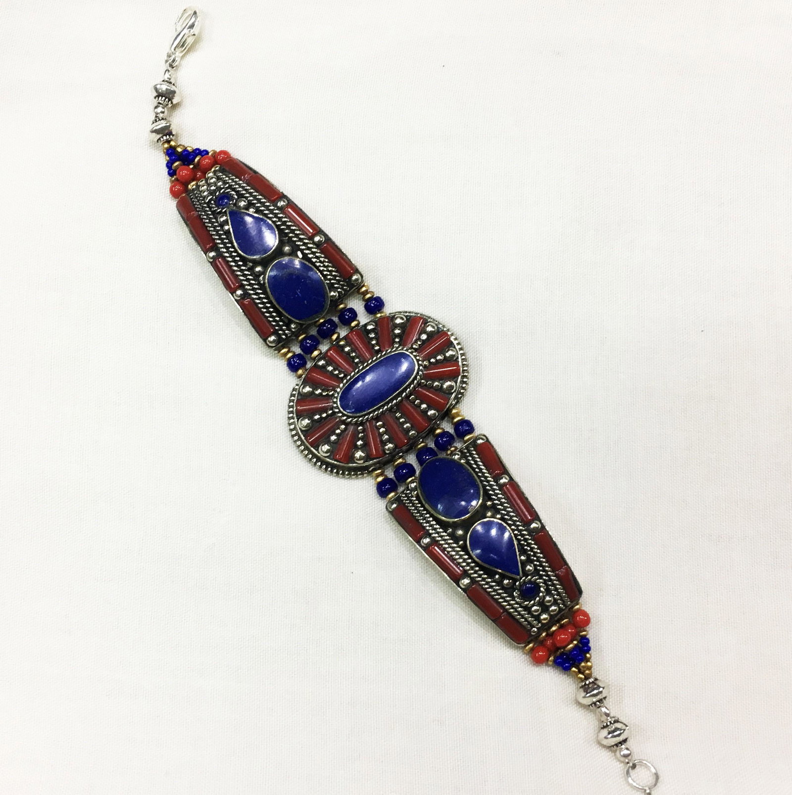 Ethnic Antique Lapis Choker Handmade Bracelet: TIBETAN TURQUOISE & CORAL HANDMADE BRACELETWeight: 30 Gram ApproxGemstones: Turquoise & Coral, LapisBrand: HandmadeBracelet Length: 6 to 7 InchCountry/Region of Manufacture: Kathmandu/Nepal