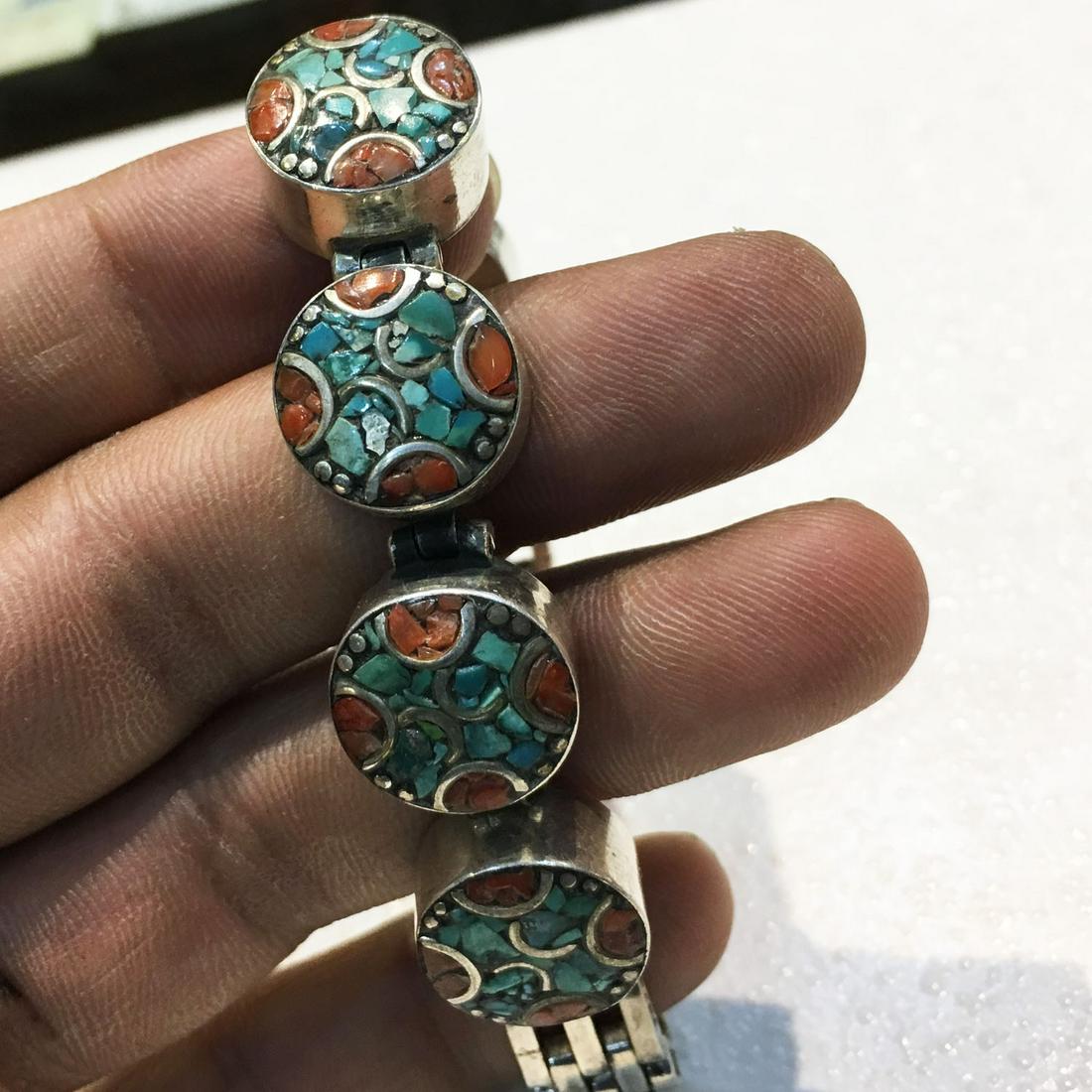 Antique Sterling Silver Turquoise & Coral Bracelet: 925 Sterling Silver Turquoise & Coral BraceletWeight: 47 Gram ApproxGemstones: Turquoise & CoralBrand: HandmadeBracelet Length: 7-8 ApproxCountry/Region of Manufacture: Nepal