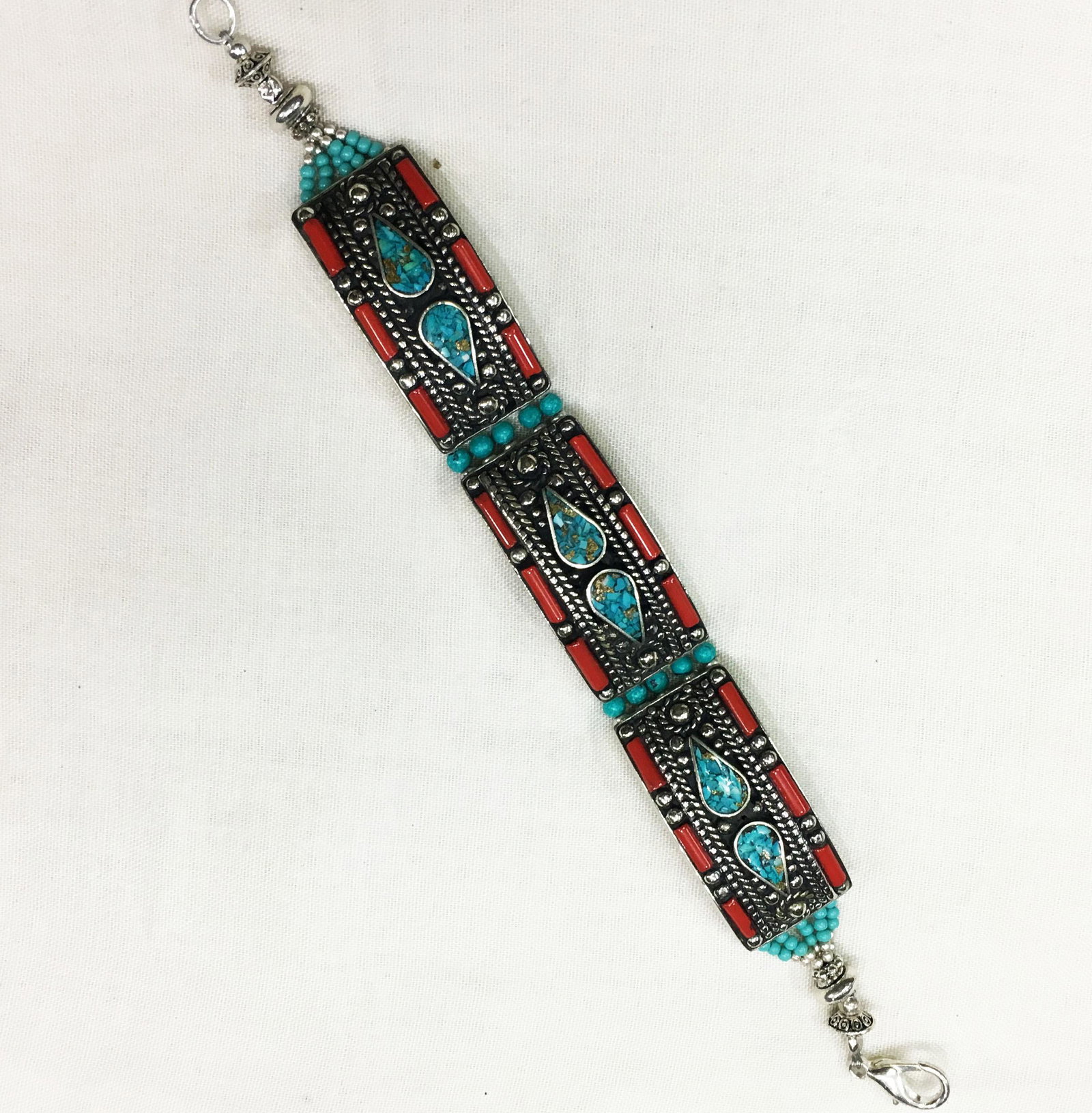 Ethnic Antique Turquoise Choker Handmade Bracelet: TIBETAN TURQUOISE & CORAL HANDMADE BRACELETWeight: 30 Gram ApproxGemstones: Turquoise & Coral, LapisBrand: HandmadeBracelet Length: 6 to 7 InchCountry/Region of Manufacture: Kathmandu/Nepal
