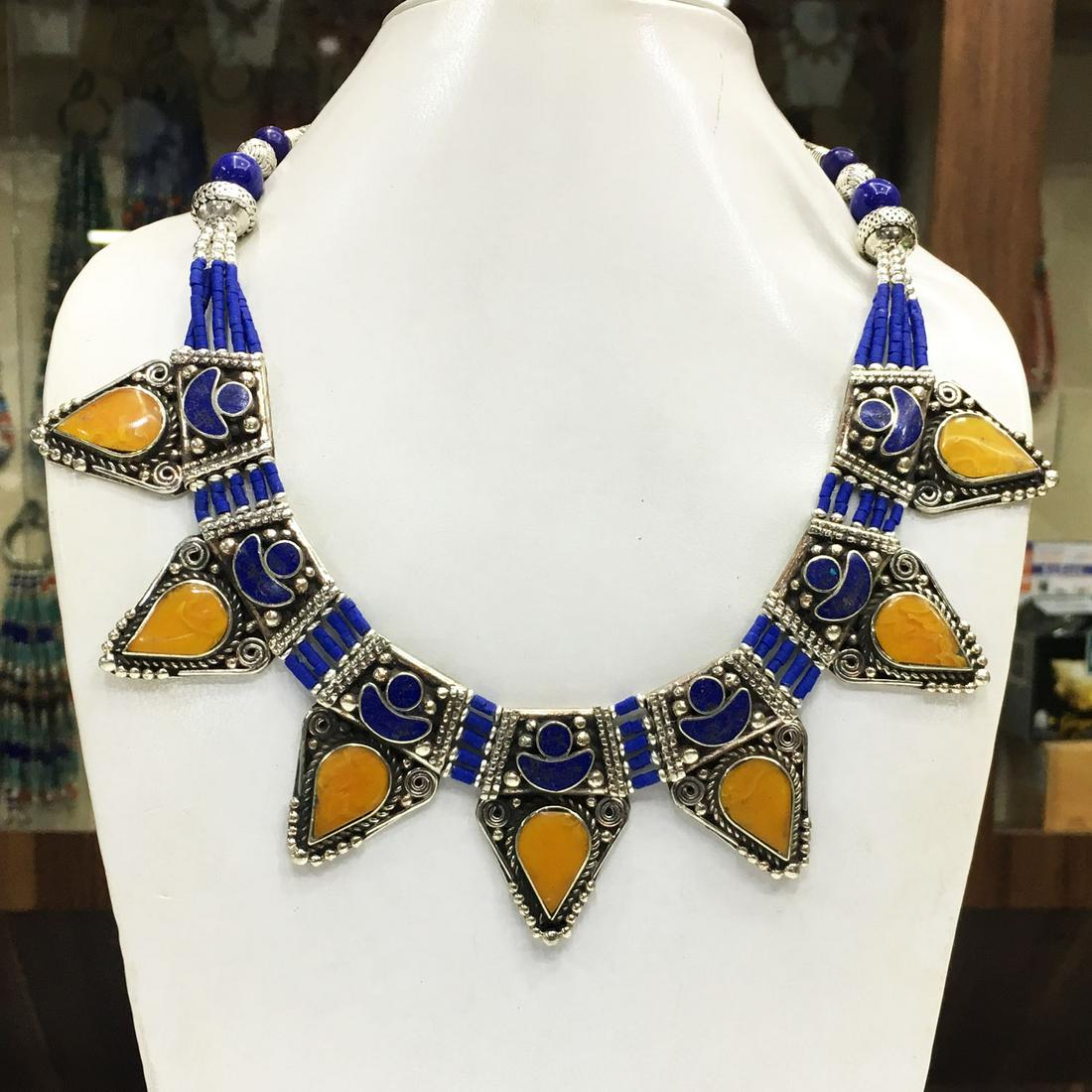 Tibetan Lapis & Amber Handmade Ethnic Necklace: Tibet Natural Stone Hand Made Turquoise, Coral & Lapis Necklace......This elegant Necklace was handcrafted in Tibet, the home of exquisite jewelry craftsmanship. It was skillfully made with large natu