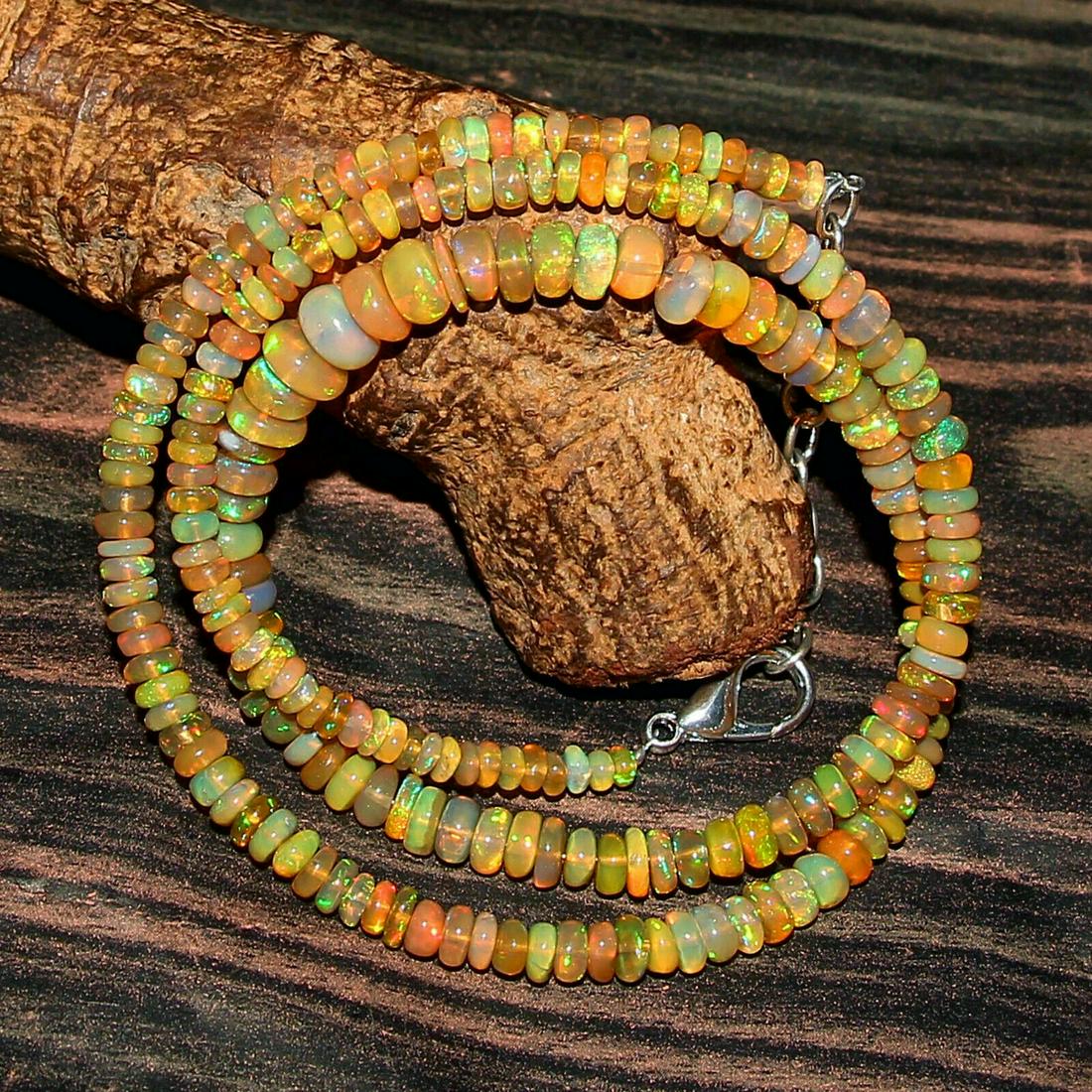 3.5-7 MM Natural Ethiopian Welo fire Opal Beads: Shape: BeadCut Grade: Very Good Country of Origin: EthiopiaColor: Multi-ColorCountry/Region of Manufacture: IndiaTransparency: Transparent Natural/Lab-Created: NaturalTreatment: None (No Enhancement) 