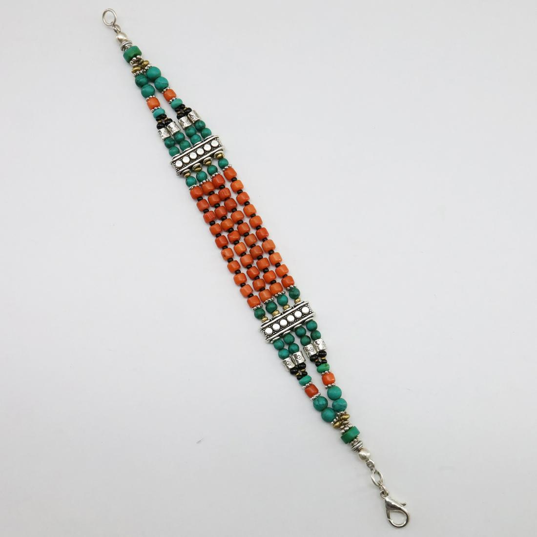 Tibetan Old Taiwani Coral Handmade Beaded Bracelet: Tibet Natural Stone Hand Made Turquoise, Coral & Lapis Bracelet......This elegant Bracelet was handcrafted in Tibet, the home of exquisite jewelry craftsmanship. It was skillfully made with large natu