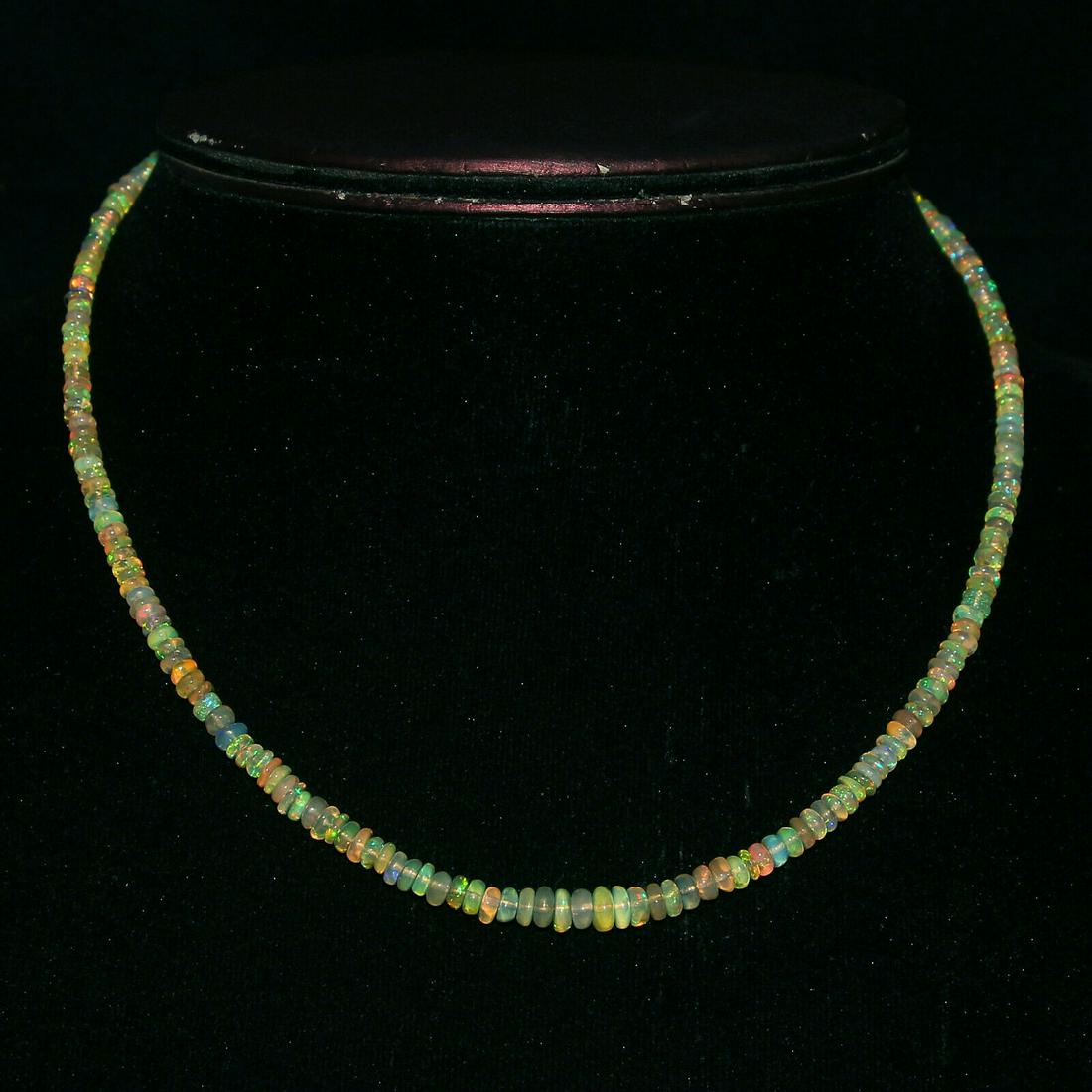 42Crt Natural Ethiopian Welo fire Opal Beads Necklace: Shape: BeadBeads Size: 3To6MM Country of Origin: EthiopiaColor: Multi-ColorCountry/Region of Manufacture: IndiaTransparency: Transparent Natural/Lab-Created: NaturalTreatment: None (No Enhancement) Le