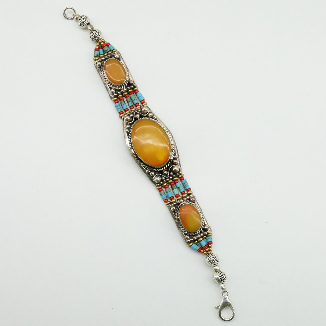 Tibetan Turquoise & Amber Handmade Boho Bracelet: TIBETAN TURQUOISE & CORAL HANDMADE BRACELETWeight: 30 Gram ApproxGemstones: Turquoise & Coral, LapisBrand: HandmadeBracelet Length: 6 to 7 InchCountry/Region of Manufacture: Kathmandu/Nepal