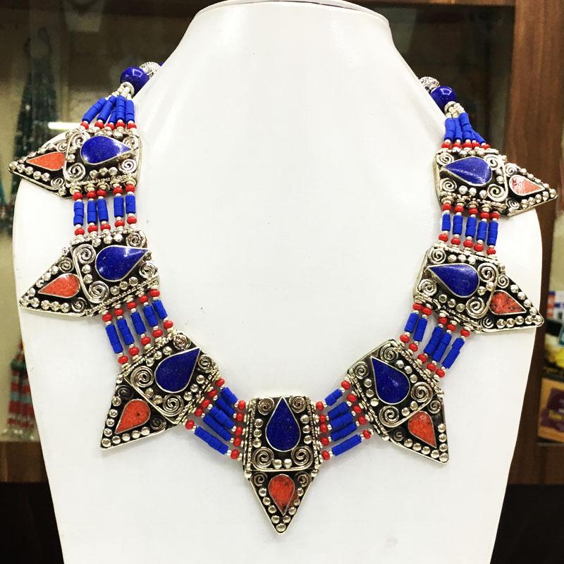 Natural Lapis & Coral Handmade Ethnic Necklace: Tibet Natural Stone Hand Made Turquoise, Coral & Lapis Necklace......This elegant Necklace was handcrafted in Tibet, the home of exquisite jewelry craftsmanship. It was skillfully made with large natu