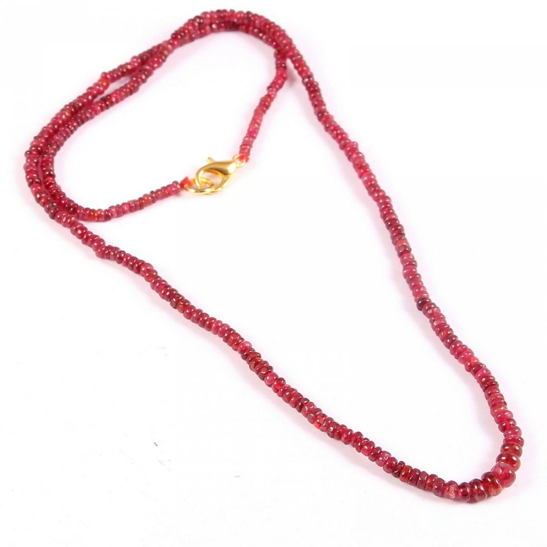 Natural Burma Spinel Necklace Rondelle Beaded 5-2 MM: Gemstone: Red SpinelStone Creation: NaturalCountry of Origin: BurmaTreatment: NoSize: 2-5 MMNecklace Length: 18 InchTransparency: TranslucentTotal Carat Weight (TCW): 45 Cts