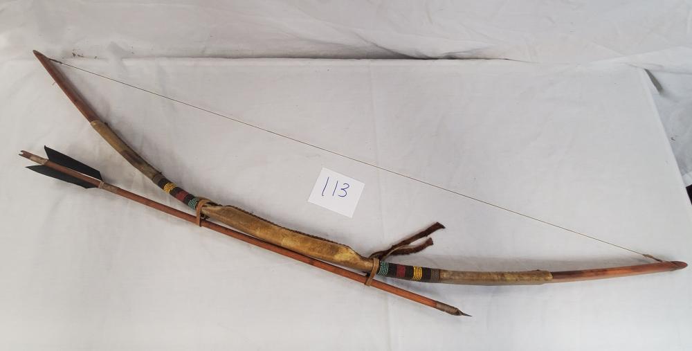 Native American Apache Bow and Arrow set with beadwork: Collected in the 1990's on a crosscountry venture visiting many different reservations, this was aquired at the Apache resrvationapprox. 48"