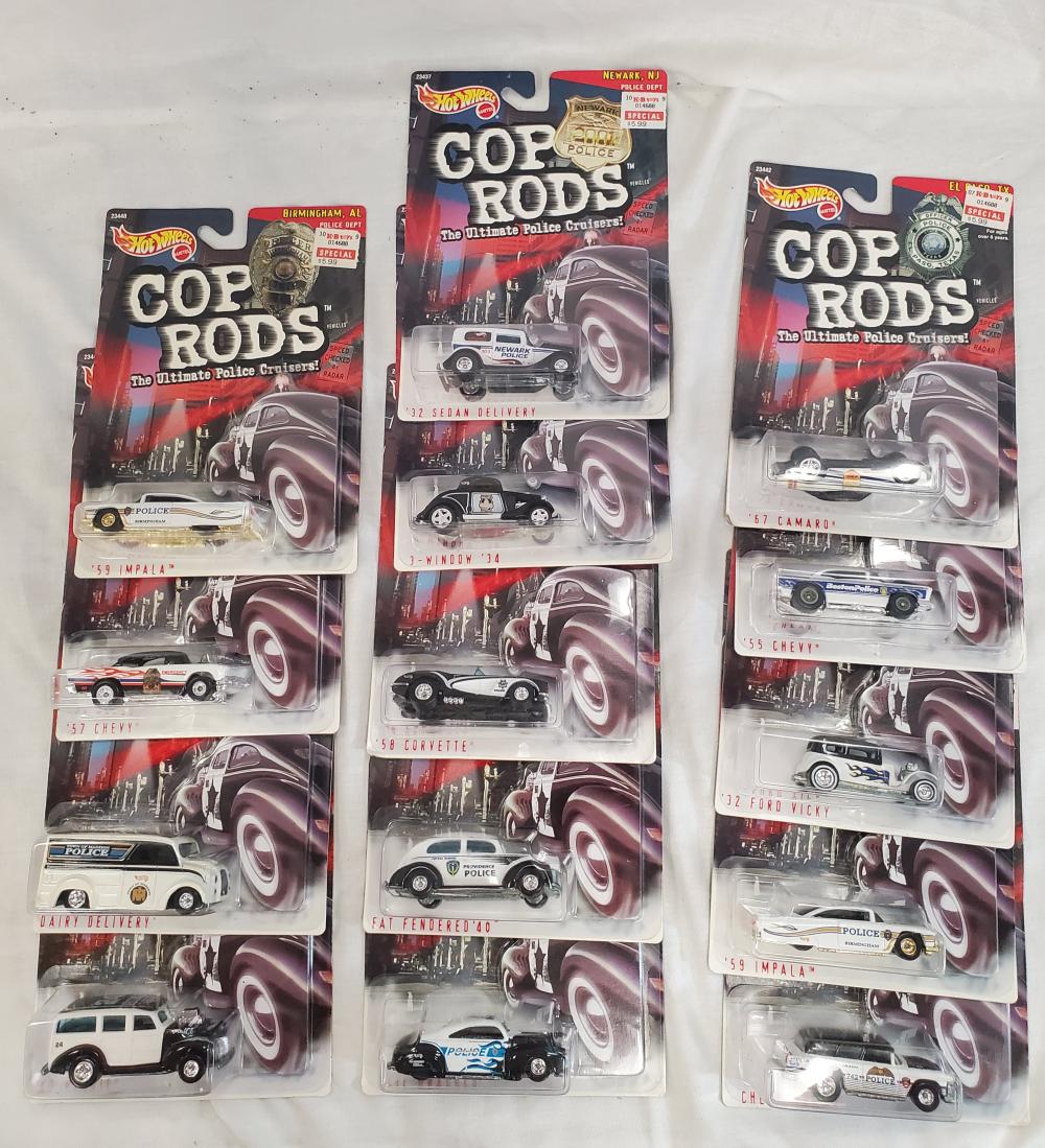 Set of 14 Hot wheels Cop Rods new old stock: all cars are mint on card and range from the 90's to the early 2000's