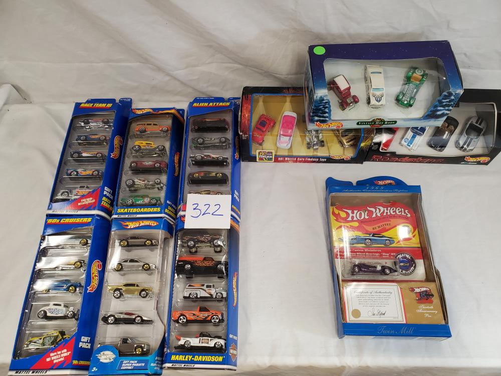 Large Lot of 10 Hot wheels Sets: all cars are mint on card and range from the 90's to the early 2000's