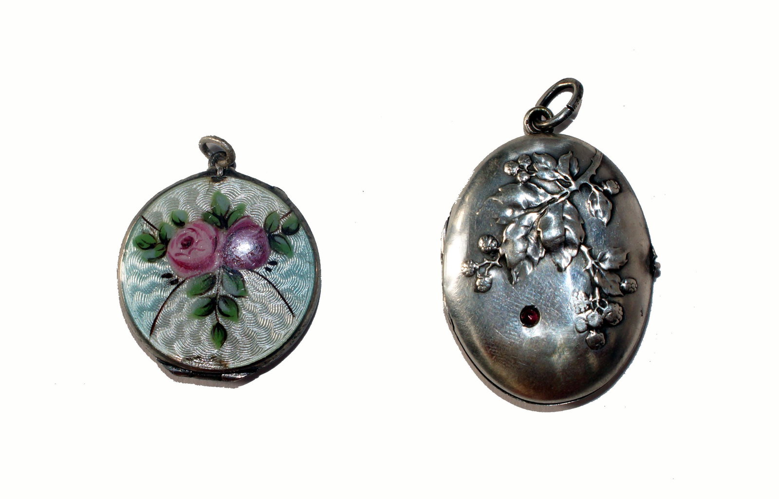 Antique Russian Silver and Enamel Pendant: Two Antique Russian pendants, both of them opens up, size, oval 1" x 1.5", round 1", total weight 10 gram