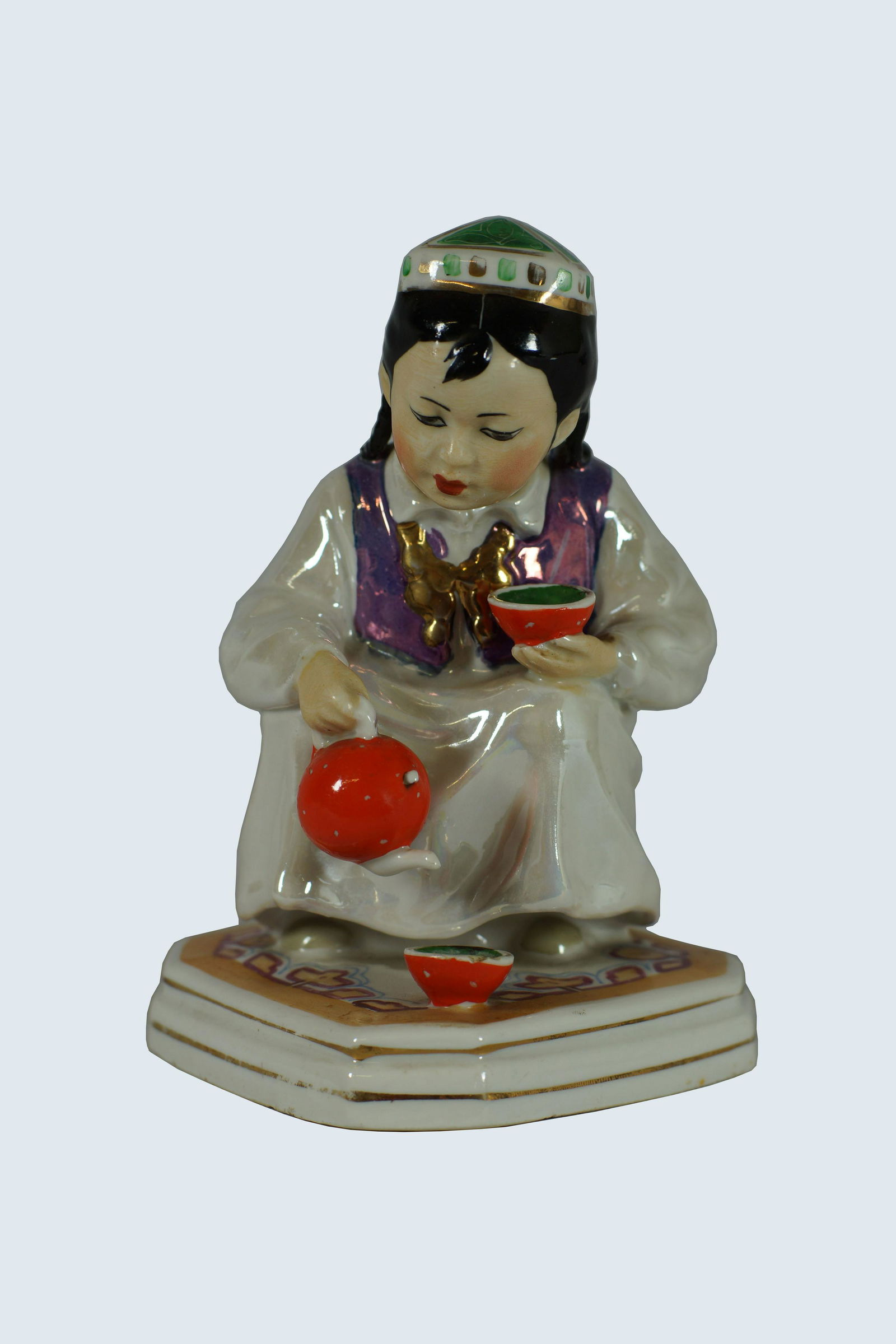 Vintage Russian Soviet Porcelain Figurine 1959: Vintage Russian Soviet USSR Dulevo Factory Porcelain Figurine Statue of Uzbek Girl with Tea Pot. Circa 1959. Size 5.5" x 3.5"