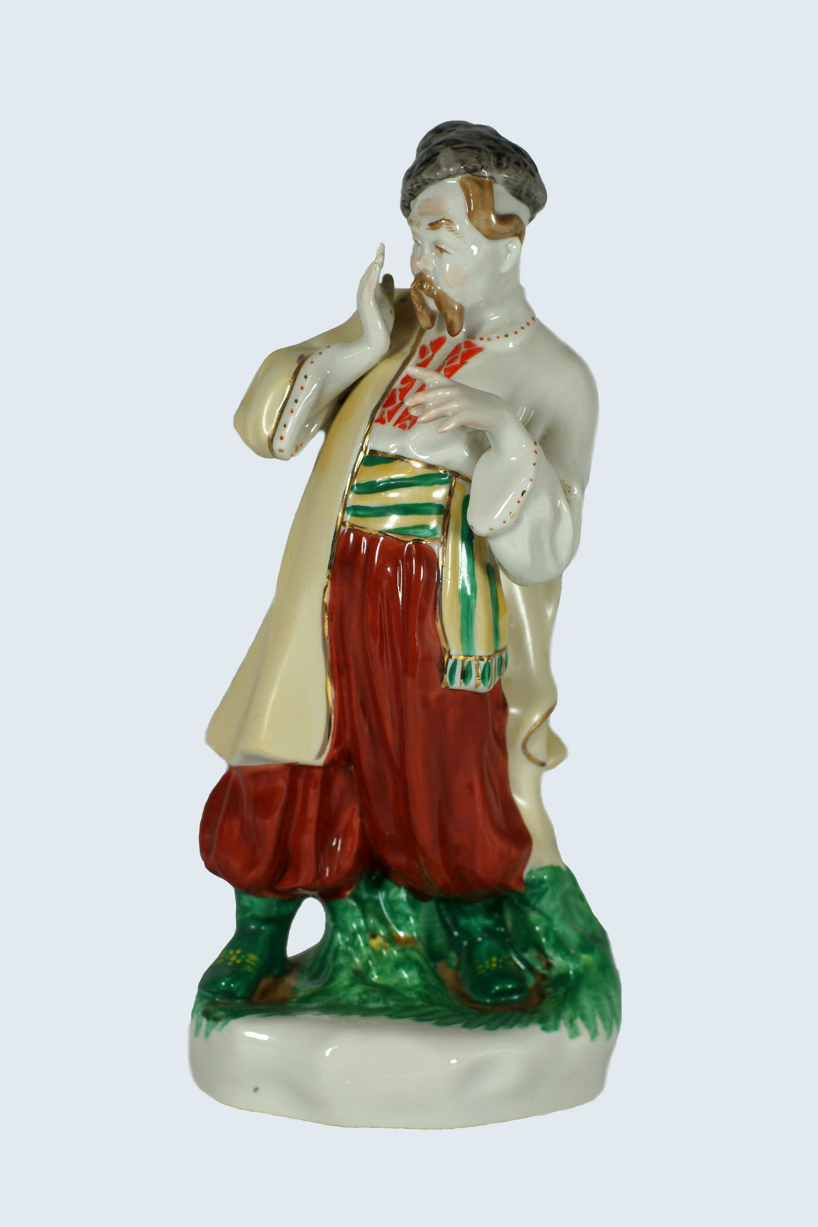 Vintage Russian Soviet Porcelain Figurine: Vintage Russian Soviet Porcelain Figurine Ukrainian Cossack. Made by Kiev Experimental Art Pottery Factory USSR .Circa 1960"s. Size 10" x 4".