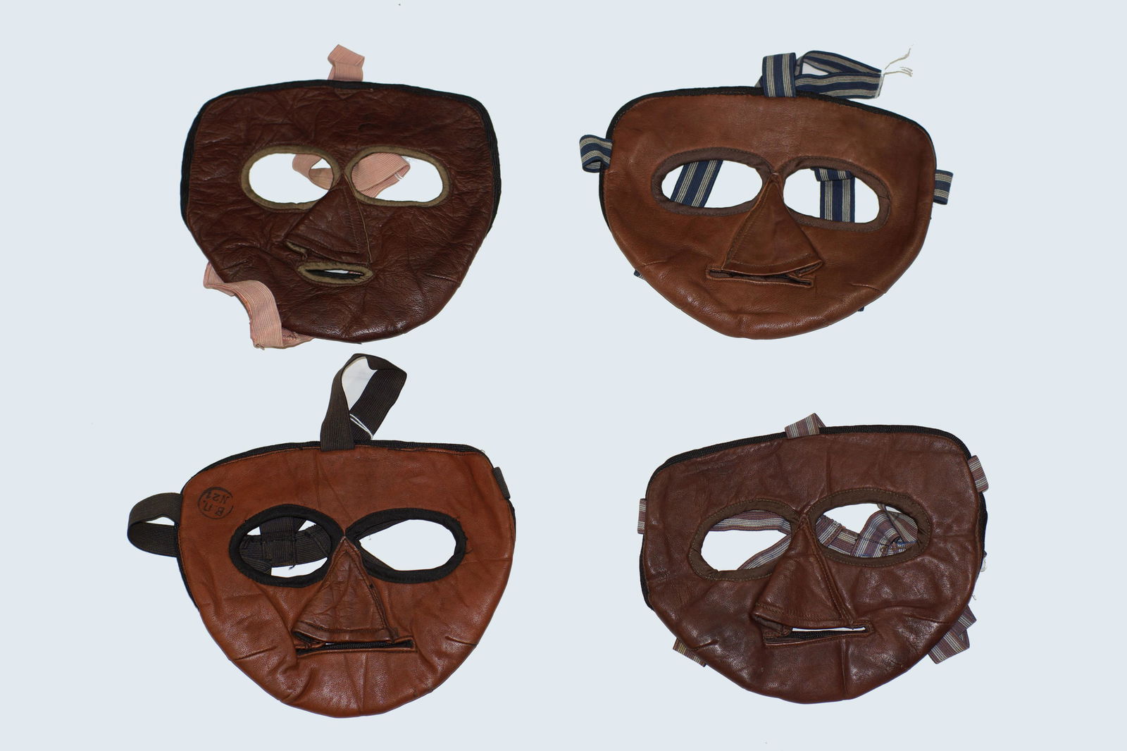 WW2 Soviet Russian Flight Masks. Lot of Four.: WW2 Pilot MASK THE RED ARMY LEATHER. Lot of Four. Soviet Aviator's Leather Flight Masks, dated 1941. In soft leather with satin liner and elastic straps. On the inside is a sewn-in cloth label of the