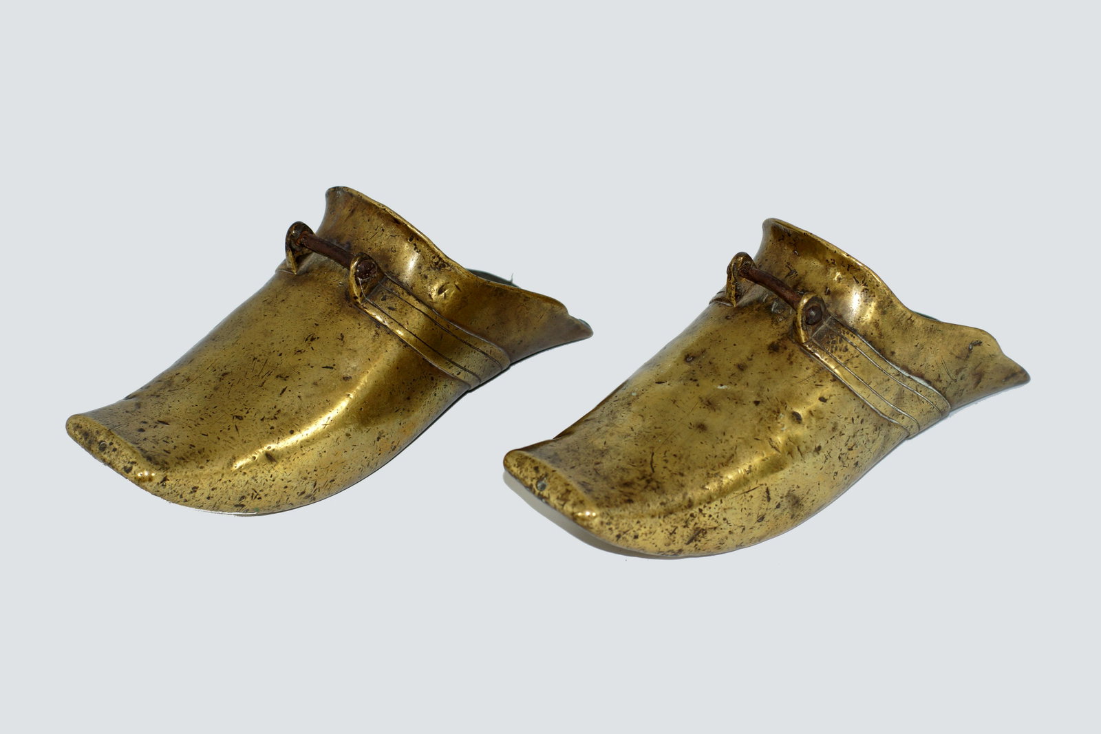 Medieval Heavy Knight's Brass Foot Stirrup Shoes: Medieval Heavy Knight's Brass foot Stirrup Shoes. Made to protect the rider's feet during combat. Shows signs of many years of usage. Size 10" X 4".