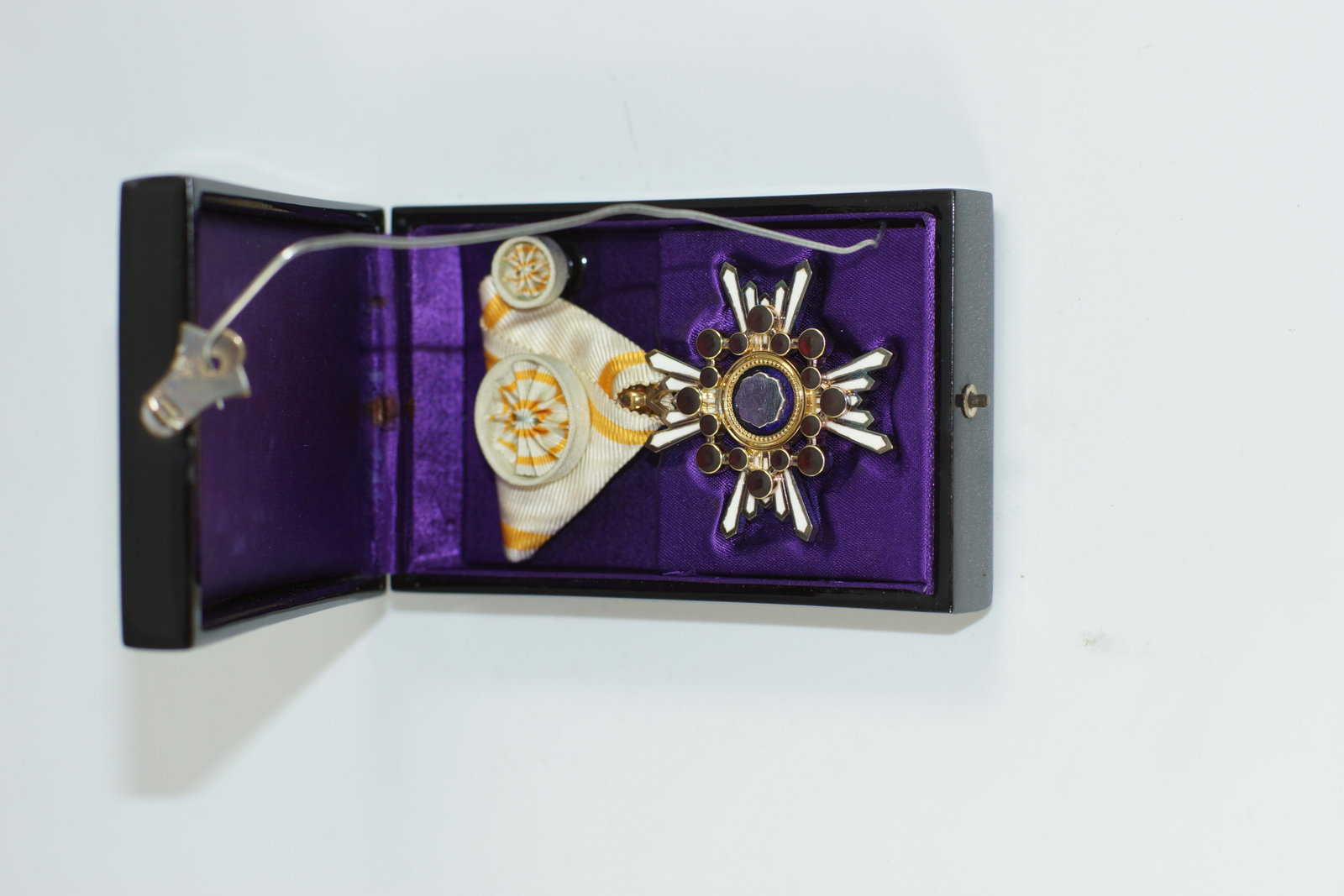 WWII JAPANESE MILITARY ORDER OF THE SACRED TREASURE 3RD: WWII JAPANESE MILITARY ORDER OF THE SACRED TREASURE 3RD CLASS. The Order of the Sacred Treasure (ç‘žå®ç« ? ZuihÅ-shÅ) is a Japanese order, established on 4 January 1888 by Emperor Meiji as 