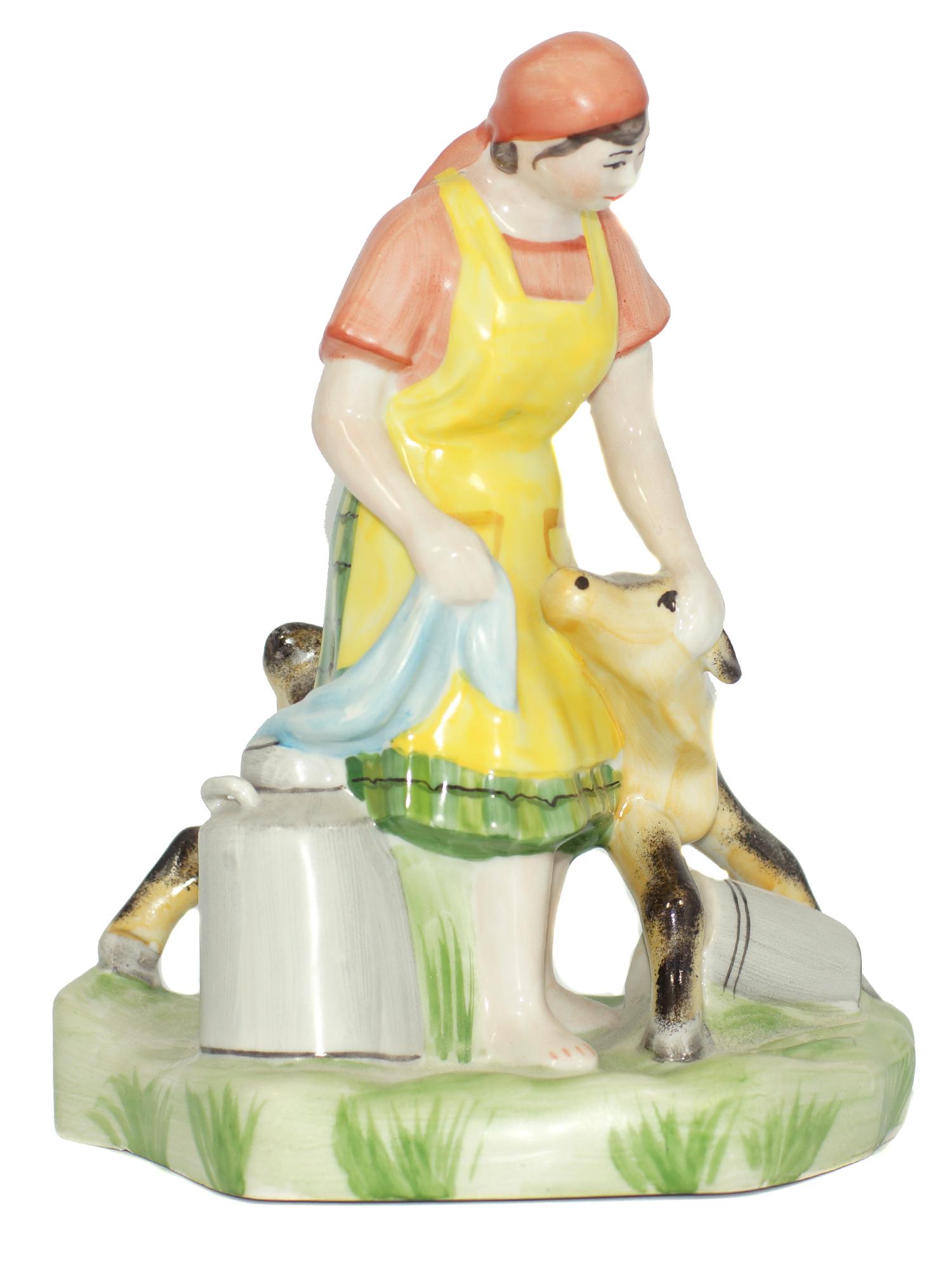 A Soviet Porcelain WWII Figurine Lady with Calf: A Soviet Porcelain WWII Figurine. Soviet worker woman with a calf. Signed by the Artist, Nazarenko. Size h 7.75".