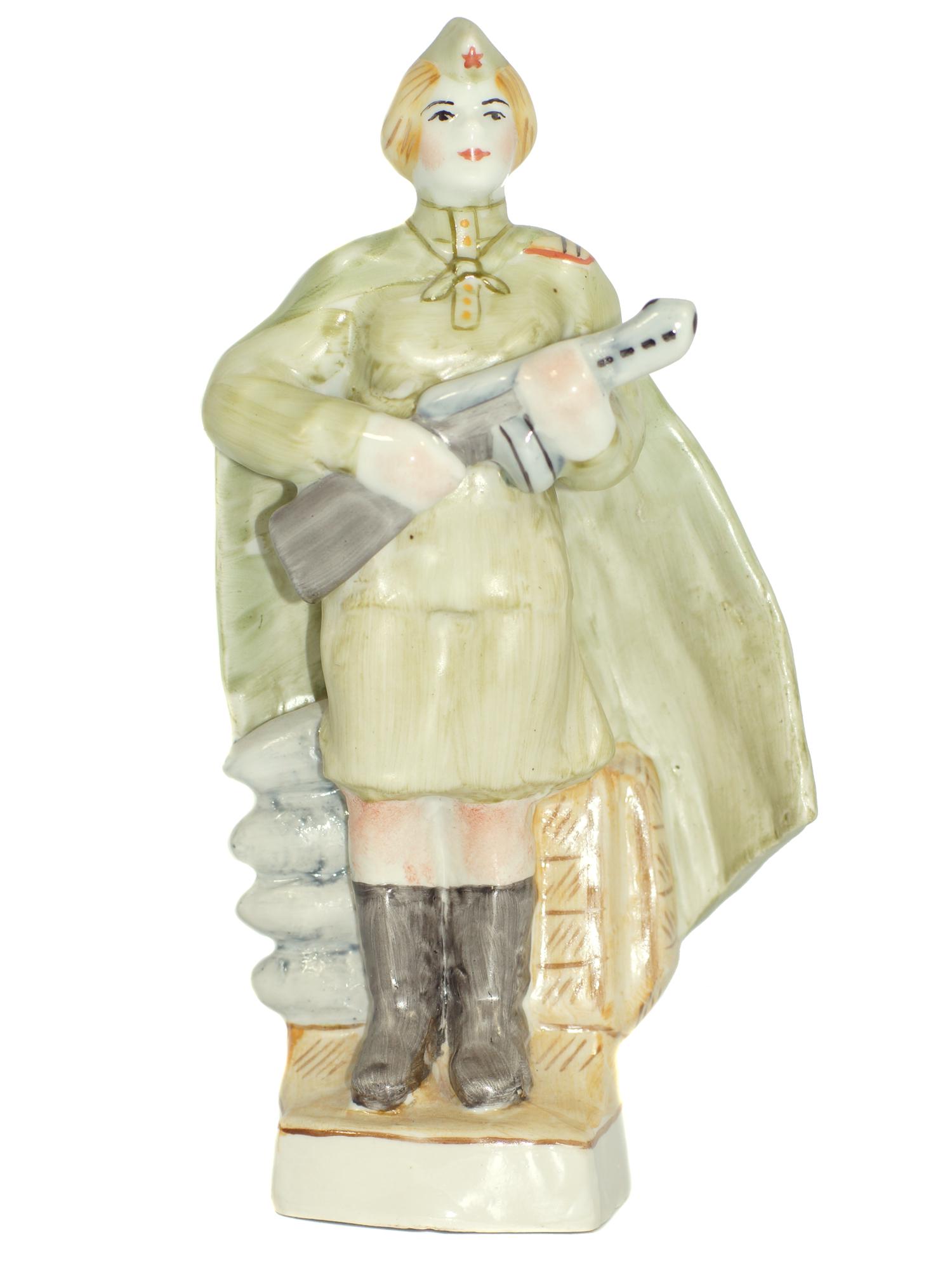 A Soviet Porcelain WWII Figurine Lady with Rifle: A Soviet Porcelain WWII Figurine. Soviet soldier woman with a rifle. Signed by the Artist, Prisyazhnyuk. Size h 7.75".