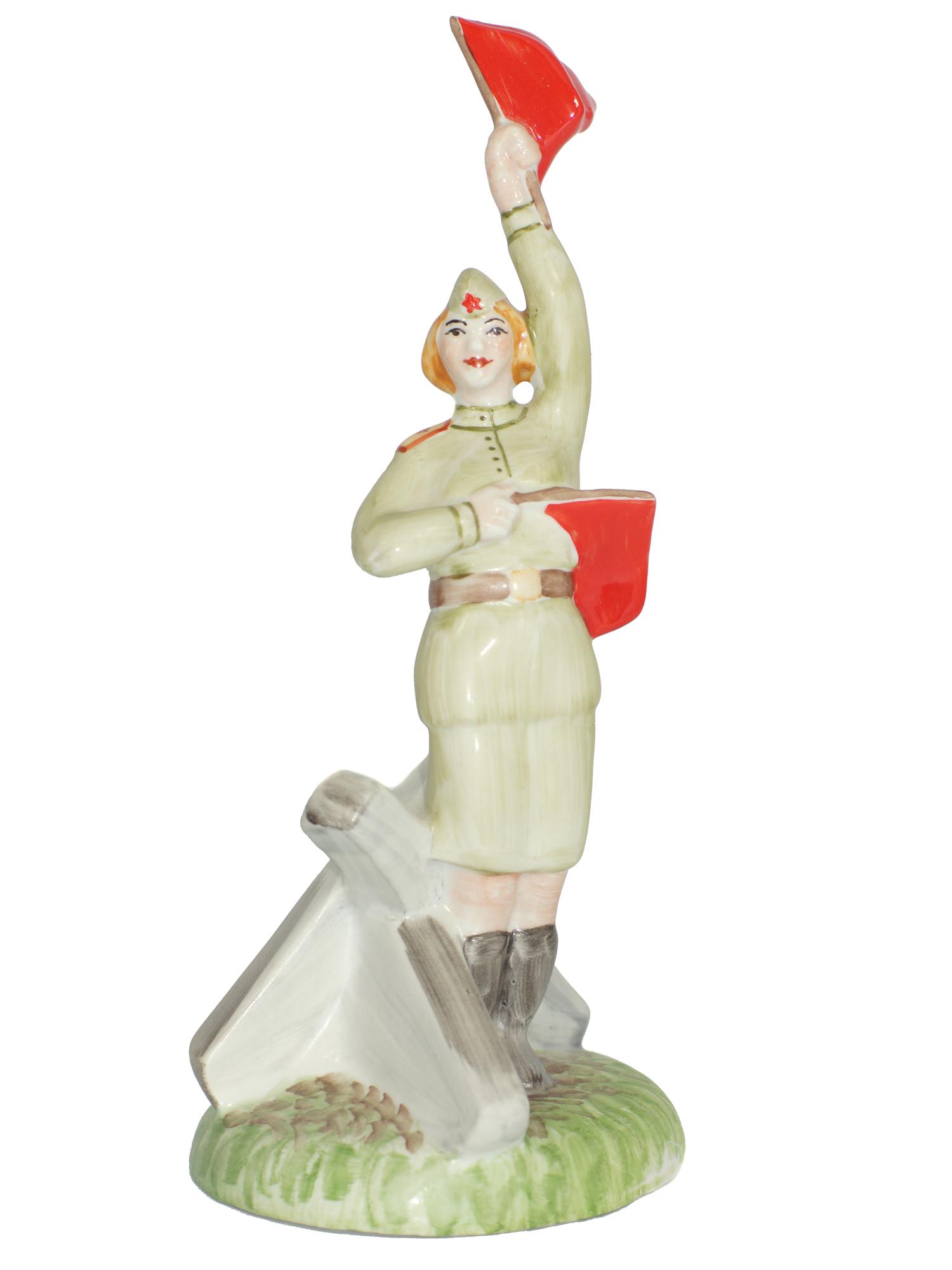 A Soviet Porcelain WWII Figurine Flag Lady: A Soviet Porcelain WWII Figurine. Soviet woman soldier with flags. Size h 8.25".