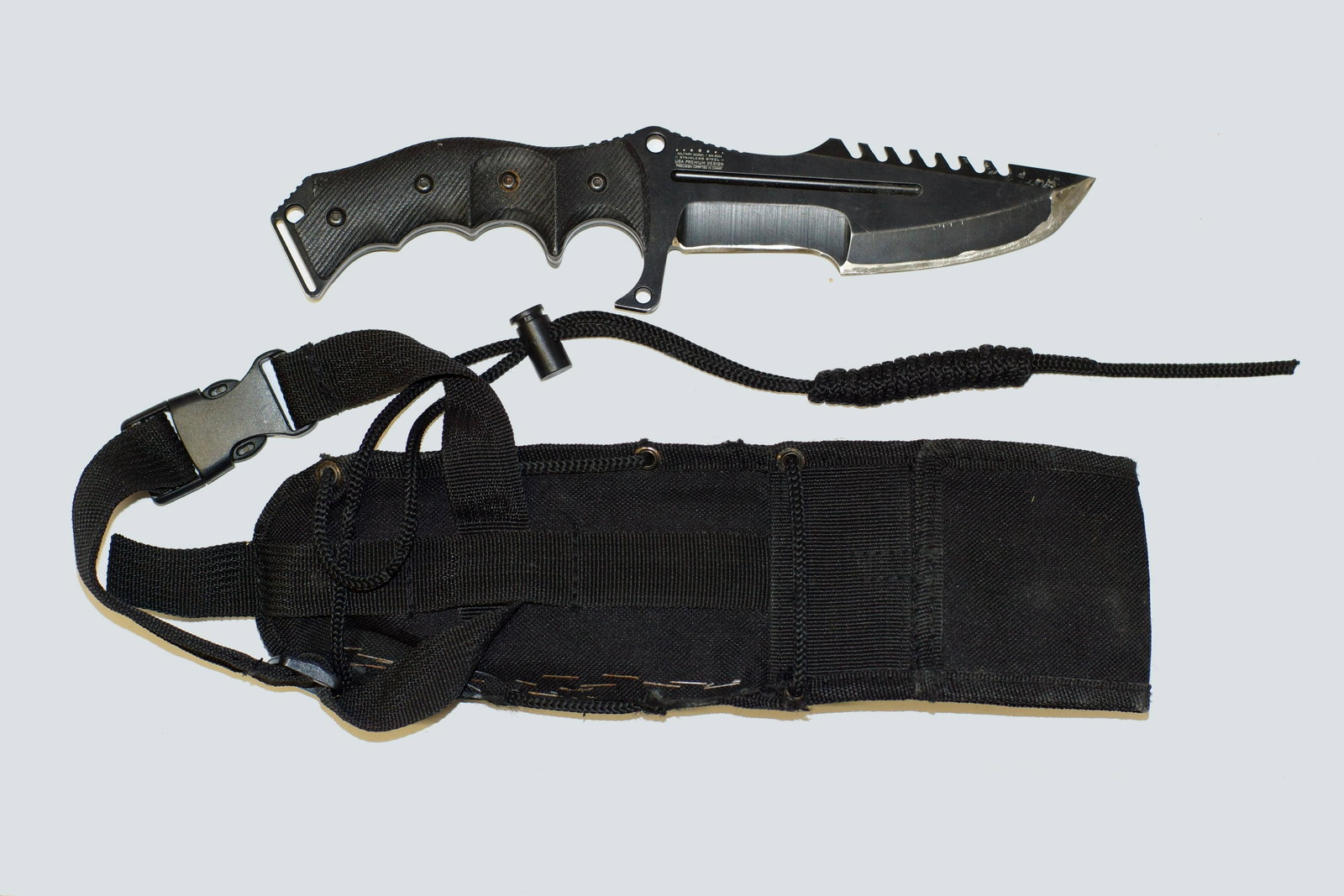 MX-8054 Fixed Blade Tactical Knife: Military Model: Stainless Steel. Crafted in China. Fixed Blade Knife 11" OVERALL. 5.5" 5.5MM THICK BLADE, 440 STAINLESS STEEL. BLACK TANTO BLADE. BLACK G10 HANDLE WITH LANYARD HOLE. INCLUDES BLACK NYL