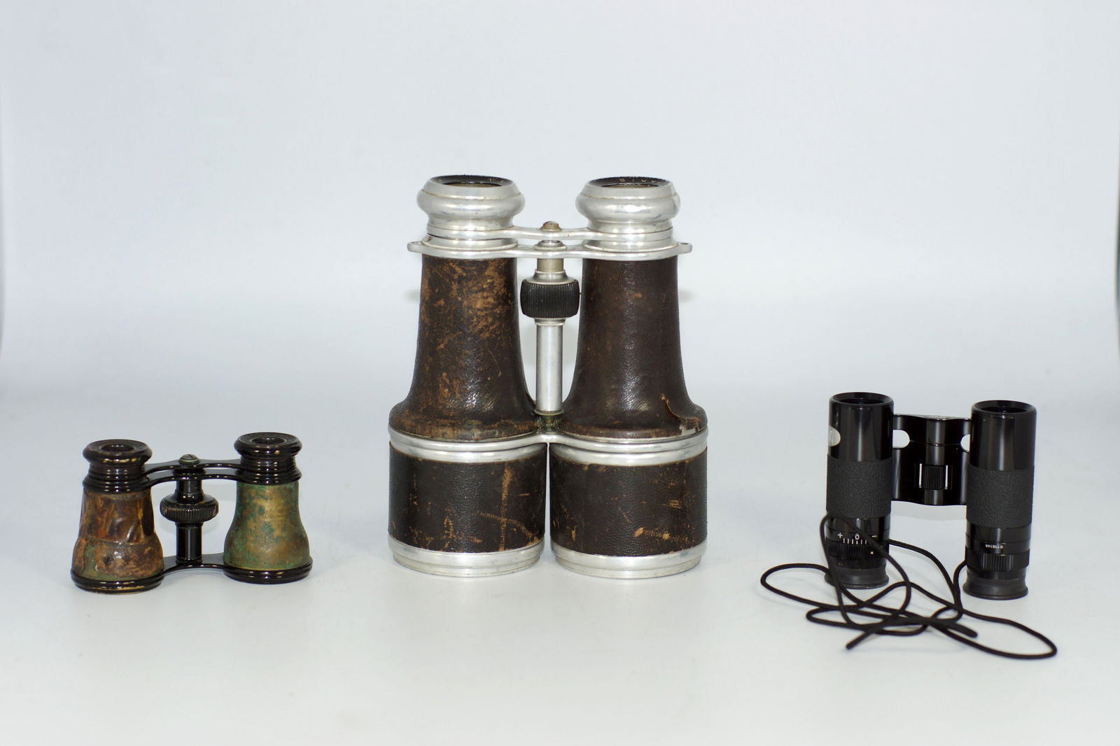 Vintage and Antique Binoculars: First Item: Vintage Lemaire Fabt Paris Binoculars Opera Glasses Steampunk Brass Patina DÃ©cor with Leather Binocular Case. Size: 2.25" in height when closed. 3.75" across the base of the lenses. Sec