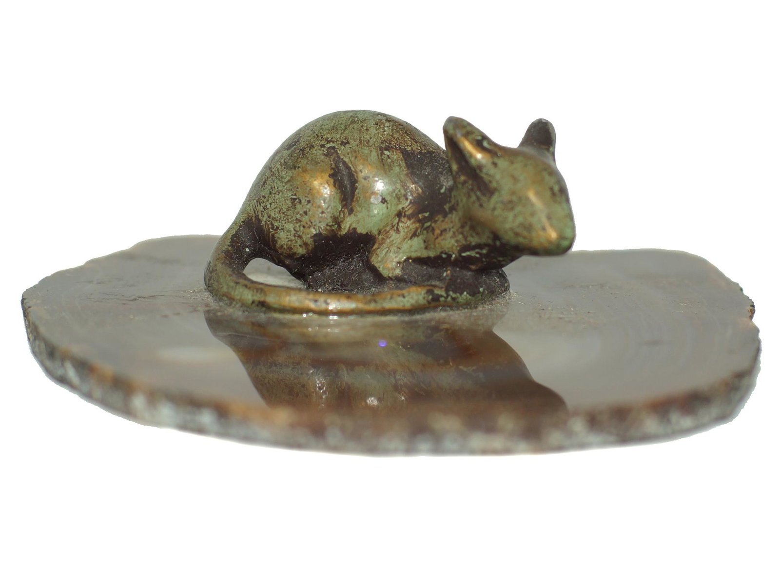 An Antique Japanese Rat on Agate Slice: The rat symbolism indicates wealth, abundance, and fertility, similar to the rabbit meaning. Rat spirit animal also symbolizes an abundant period that will soon take place. Size: 3 1/2 X 3 1/4 X 1 1/4
