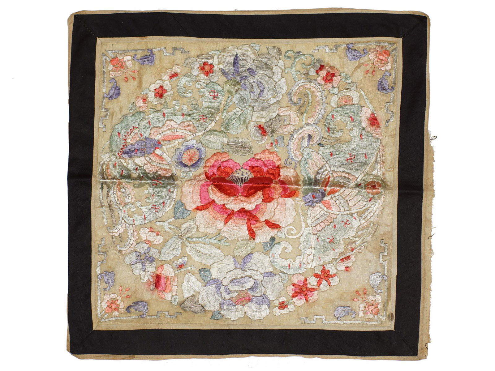 A Vintage Chinese Silk Wall Floral Panel: A beautiful matted hand-embroidered silk panel from 1920-30s. A large bold red flower in the center is surrounded by a circle of flowers, which is further bordered by floral corner decoration. The Pan