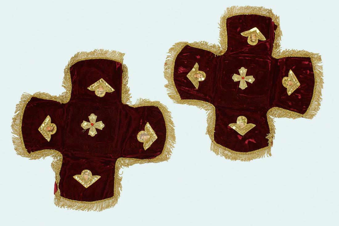 TWO RUSSIAN EMBROIDERED CHALICE VEILS, 19TH C.: The set consists of two beautiful velvet burgundy veils in the form of crosses, decorated with beads, sequins, embroidery and paper angels. These items are used in the Orthodox liturgy. Dimensions: 17