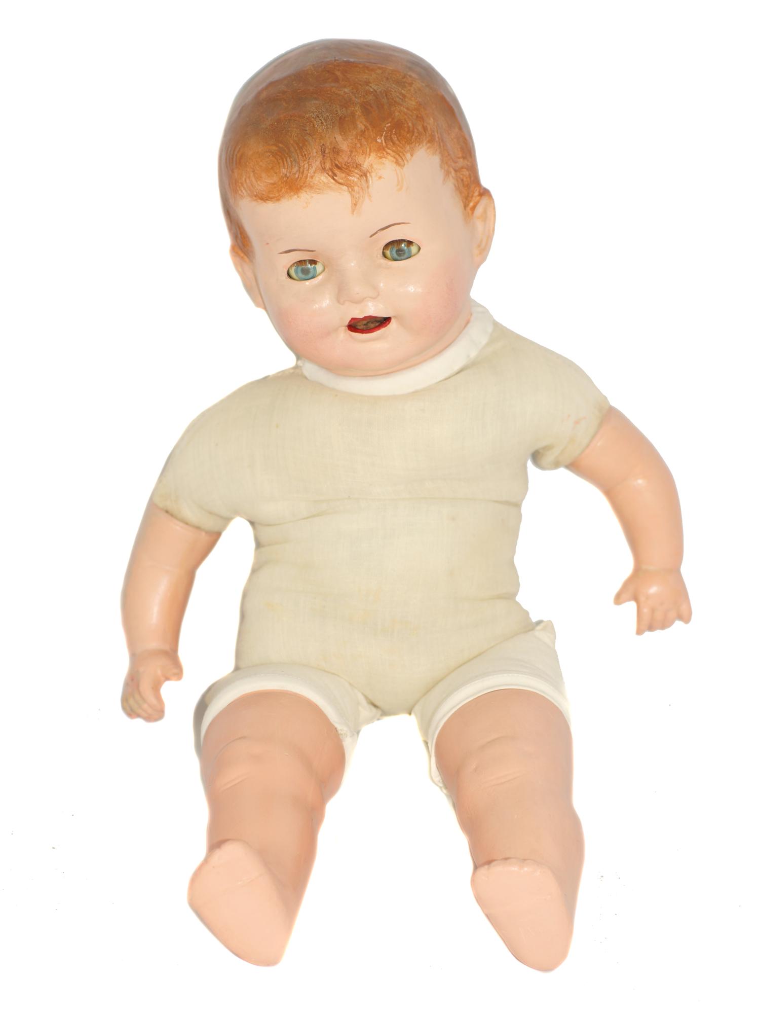 VINTAGE AMERICAN PLASTIC BABY DOLL: Vintage plastic doll with no clothing and hair painted on. Unmarked by manufacturer. Dimensions: L 25 in.