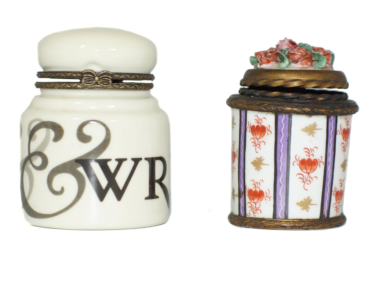 A VINTAGE PORCELAIN PIN AND NEEDLE TRINKET BOXES: A vintage porcelain trinket boxes, pin and needle compartments. First: in the form of a tiny jar has &&&WRITE written on it. Second: a trinket box is decorated with a floral lid. Both trinket boxes ar