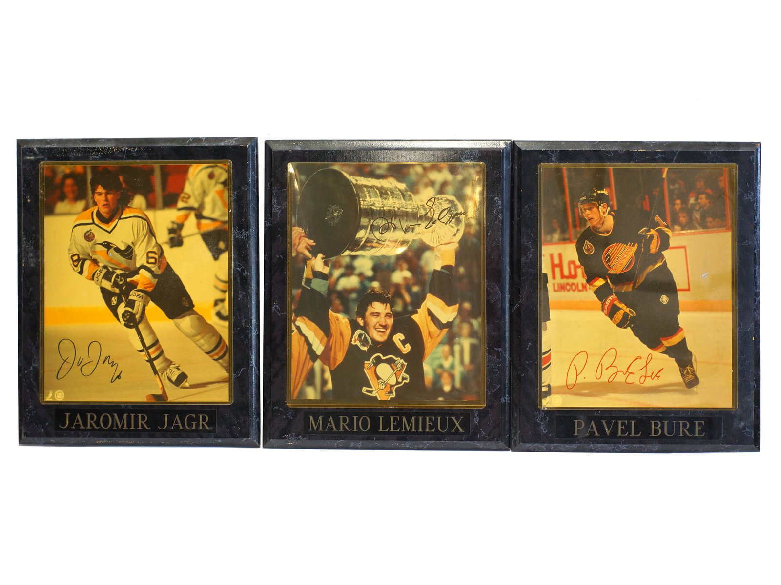 A VINTAGE HOCKEY ROOKIE PLAYER SIGNED PHOTOGRAPHS: A rare rookie hockey player photographed plaques, certified by NHL league. First Item: Vintage 1990's signed photograph plaque of Jaromir Jagr #68 on the Pittsburgh Penguins. Second Item: Vintage 1990