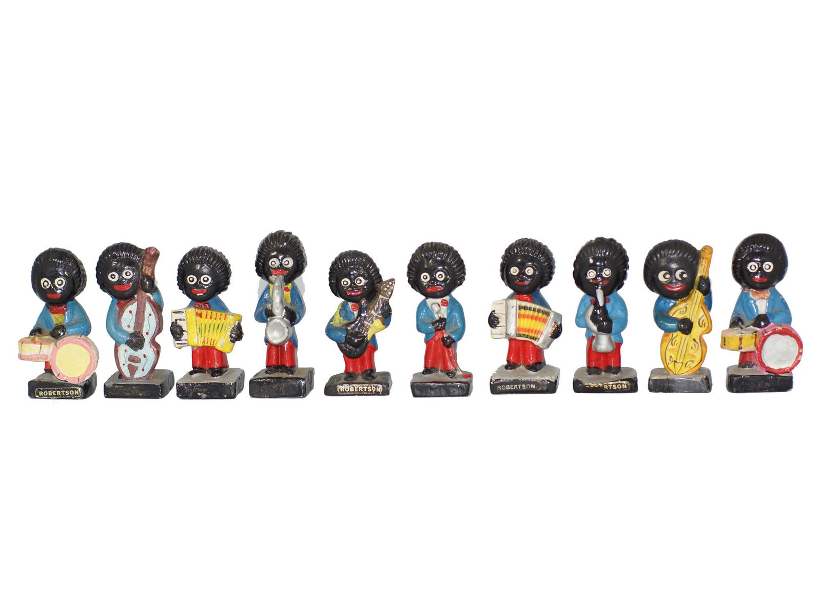 A SET OF TEN ROBERTSON'S BAND FIGURINES: Vintage Robertson's Jam Musician Figurines. Each figurine is a member of the band with a different instrument such as a microphone, accordion, trumpet, double bass, drum, guitar, snare drum, and saxop