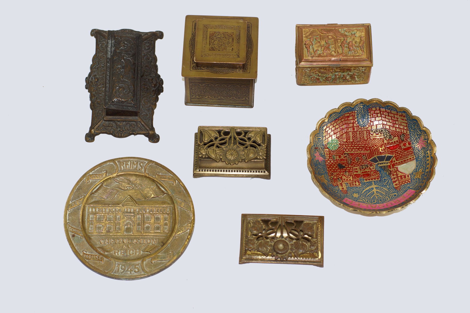 A VINTAGE ASSORTED BRASS ITEMS: First Item: Little Red School Reims Capitulation du Reich Brass Plaque. Year 1954 . Second Item: Vintage copper over brass pin and needle relief box of victorian scene. Third Item: Vintage brass Jerus