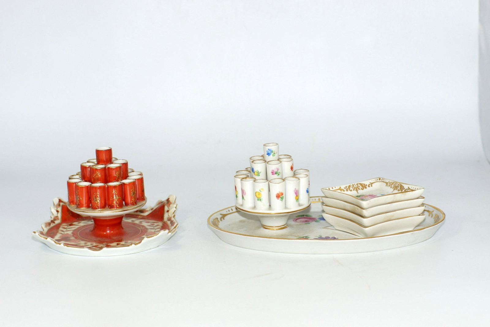 A GROUP OF VINTAGE CIGARETTE HOLDER AND ASHTRAY: Rare Plaue Schierholz cigarette holder and ashtray. Accommodated with unique Dresden cigarette holder with four separate ashtrays. The main dish and ashtrays are all stamped Dresden underneath Dimensi