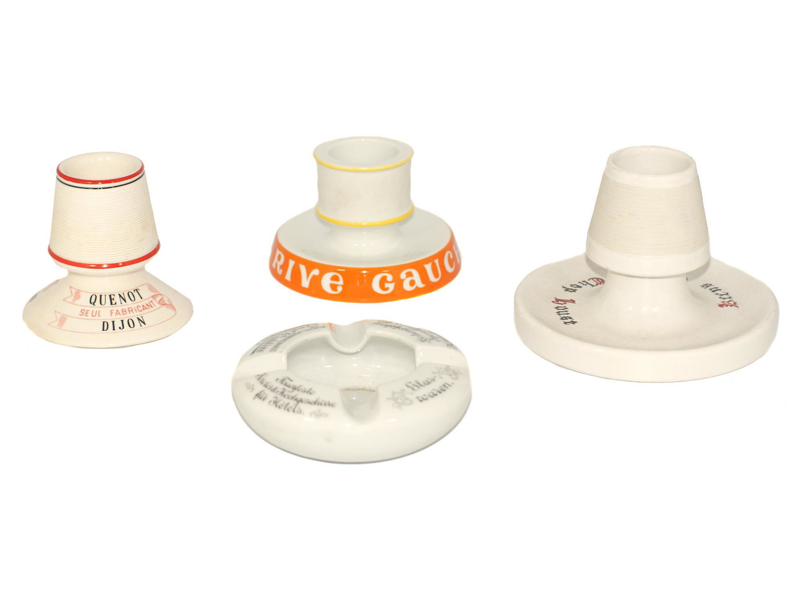 AN ANTIQUE ADVERTISING PORCELAIN MATCH STRIKER: A group of four rare advertising match strikers holders and ashtrays. Vintage porcelain French cafe Cassis Quentin match holder and striker. Vintage Cafe De La River porcelain match striker holder and