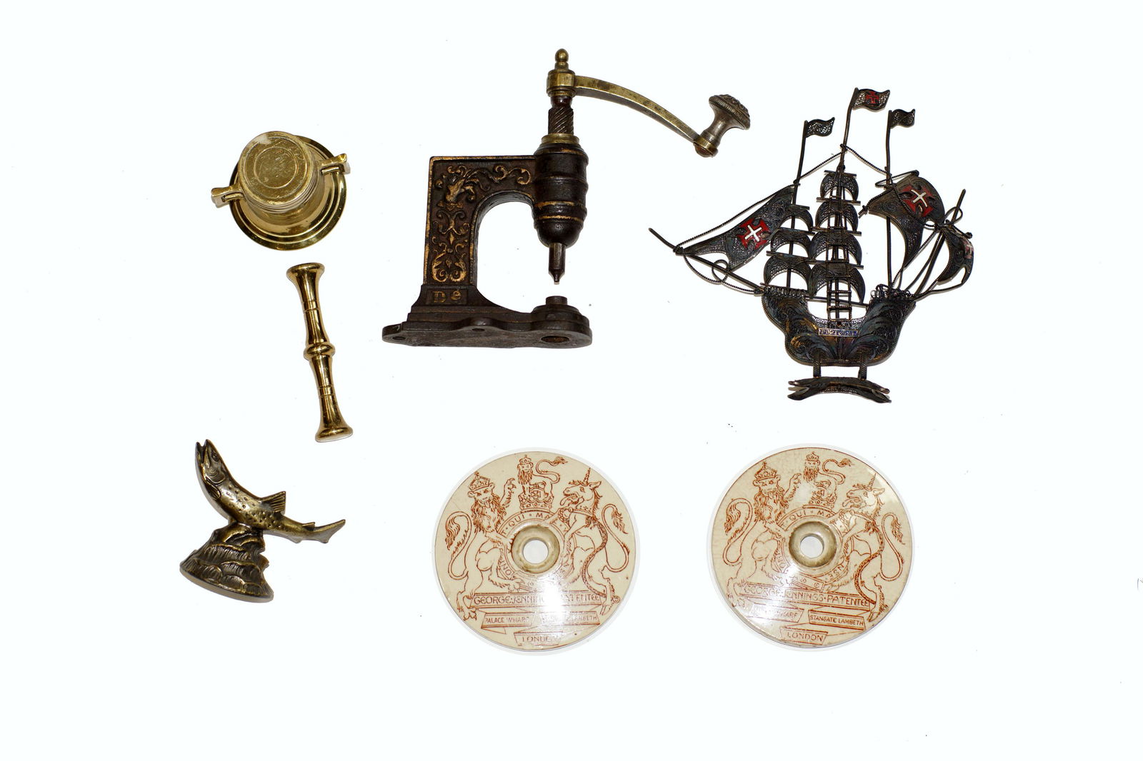 AN ASSORTED VINTAGE OBJECTS: Vintage filigree model of Galleon sailing ship, vintage brass pen holder with fish, inscribed: Lutherland Pocono Pines P.A. Two antique British porcelain plaques, antique brass watch hand tool, vintag