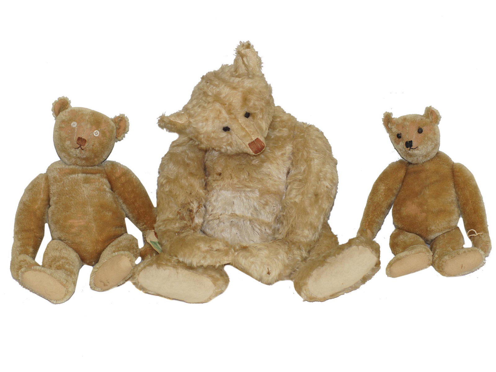 A RARE VINTAGE TEDDY BEAR BY TERRY JOHN WOODS: A group of three rare costume made Teddy Bears from Weathered collection, made by Terry John Woods. Dimensions: Smallest: 4 x 8 x 14 in. Largest: 5 x 10 x 20 in.
