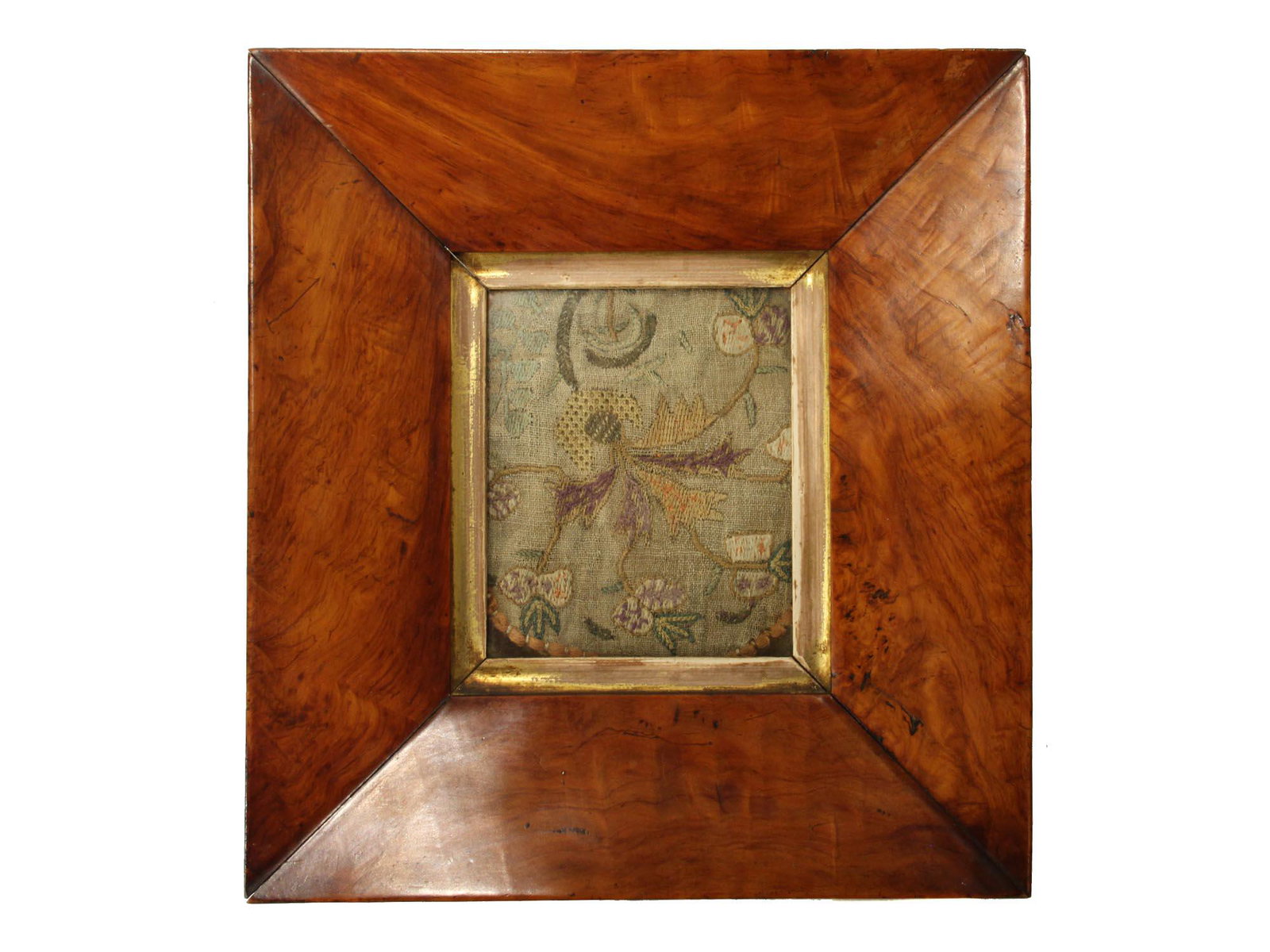 AN ANTIQUE ISLAMIC OTTOMAN EMBROIDERY IN A FRAME 17 C.: A lovely 17th century Turkish (Ottoman) embroidery with flowers and stems in wooden frame. Dimensions: 11 1/2 x 10 1/2 in., (29 x 27 cm.)